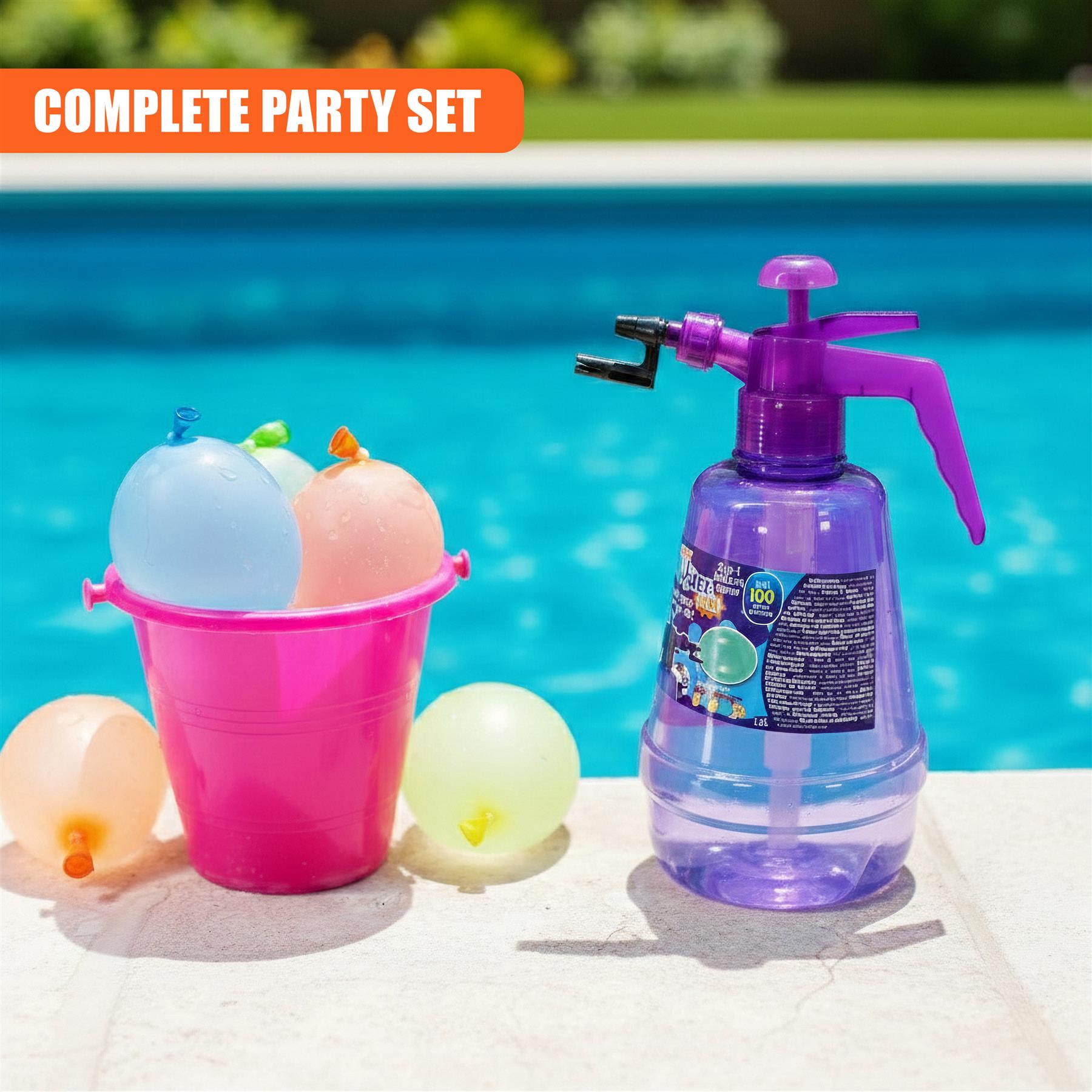 Colored water bombs sit in a pink bucket with a purple plastic spray bottle nearby.