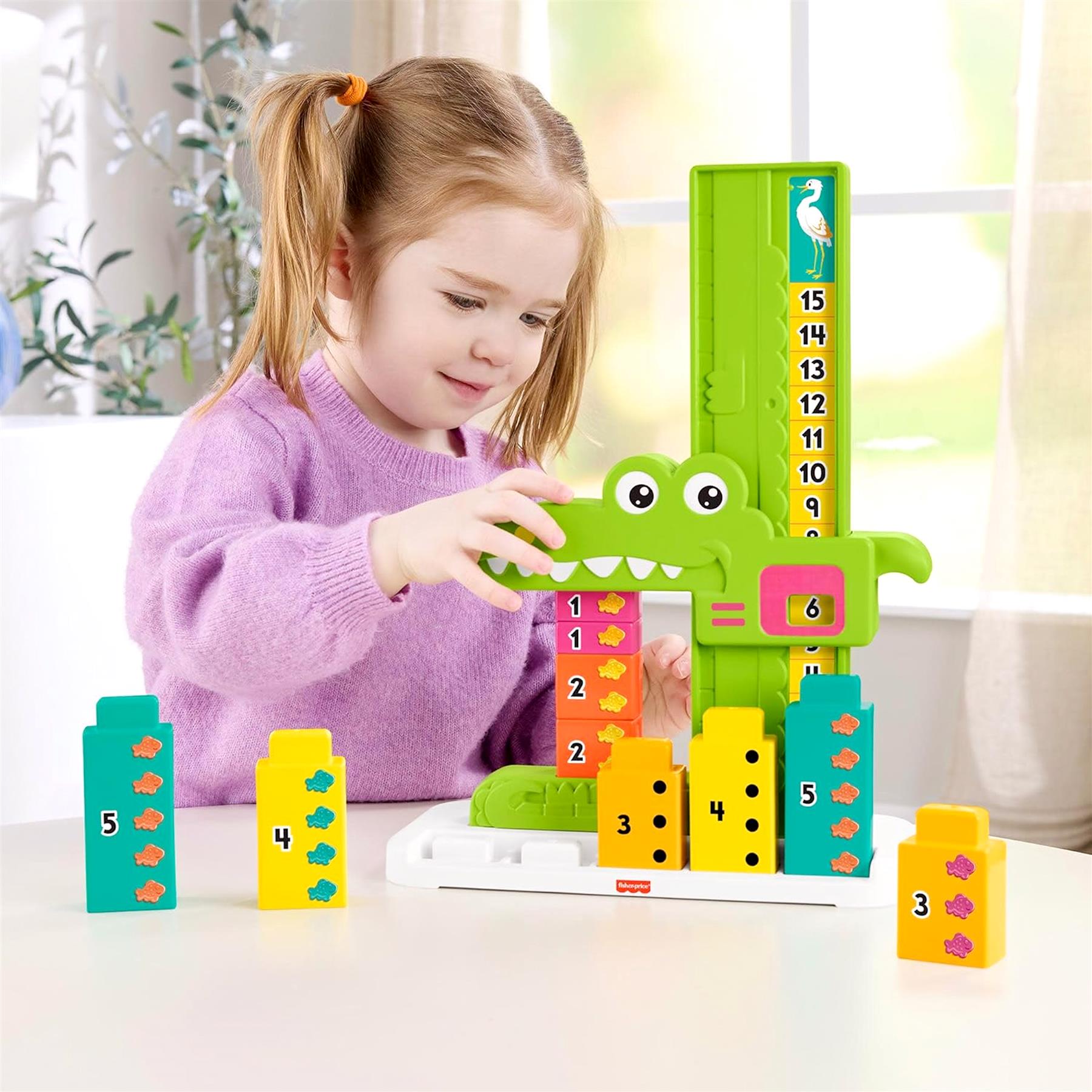 Educational toy featuring a green alligator, stackable number columns, and a tall vertical counting display.