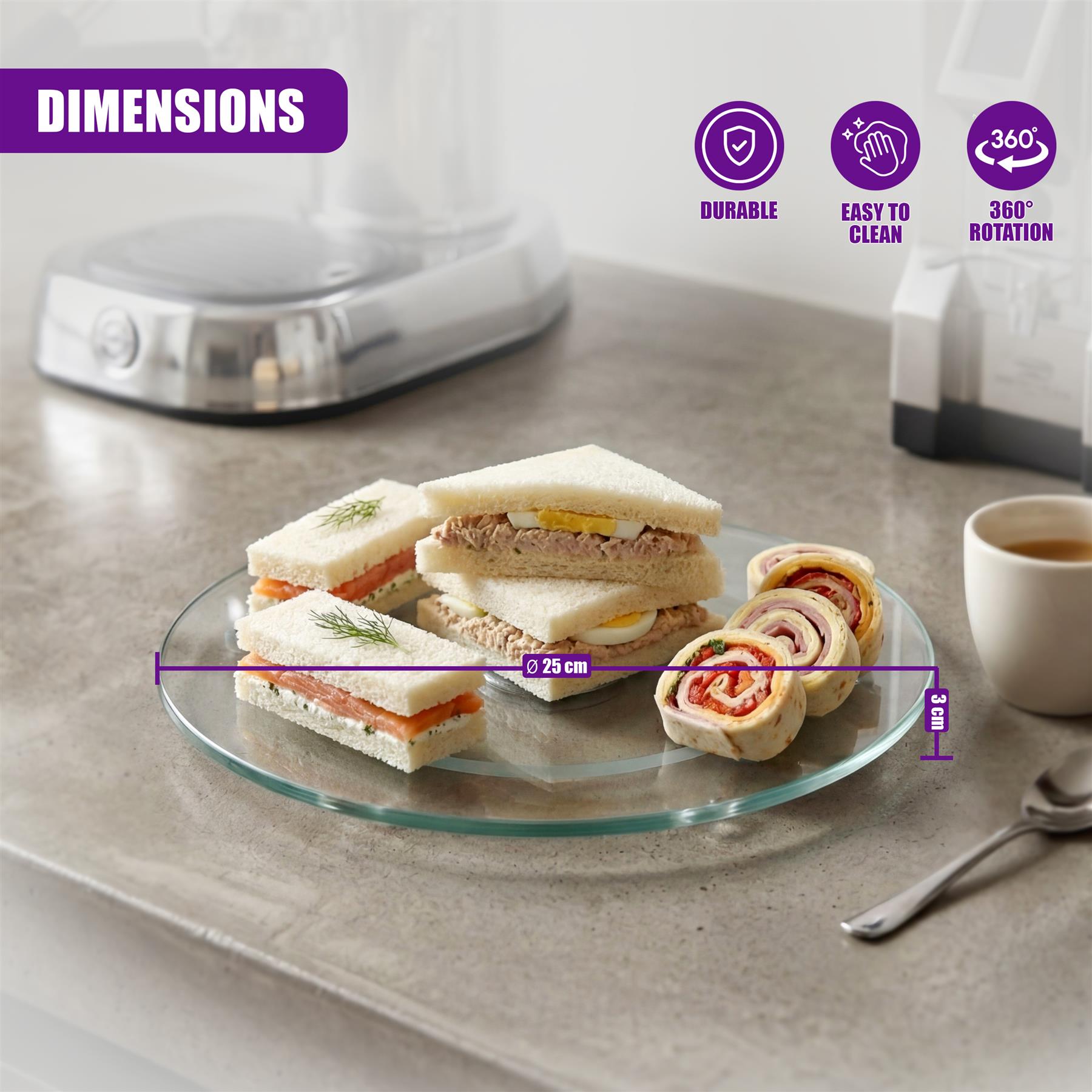 Glass turntable measuring 25 cm, presented with assorted mini sandwiches and wraps on the surface.
