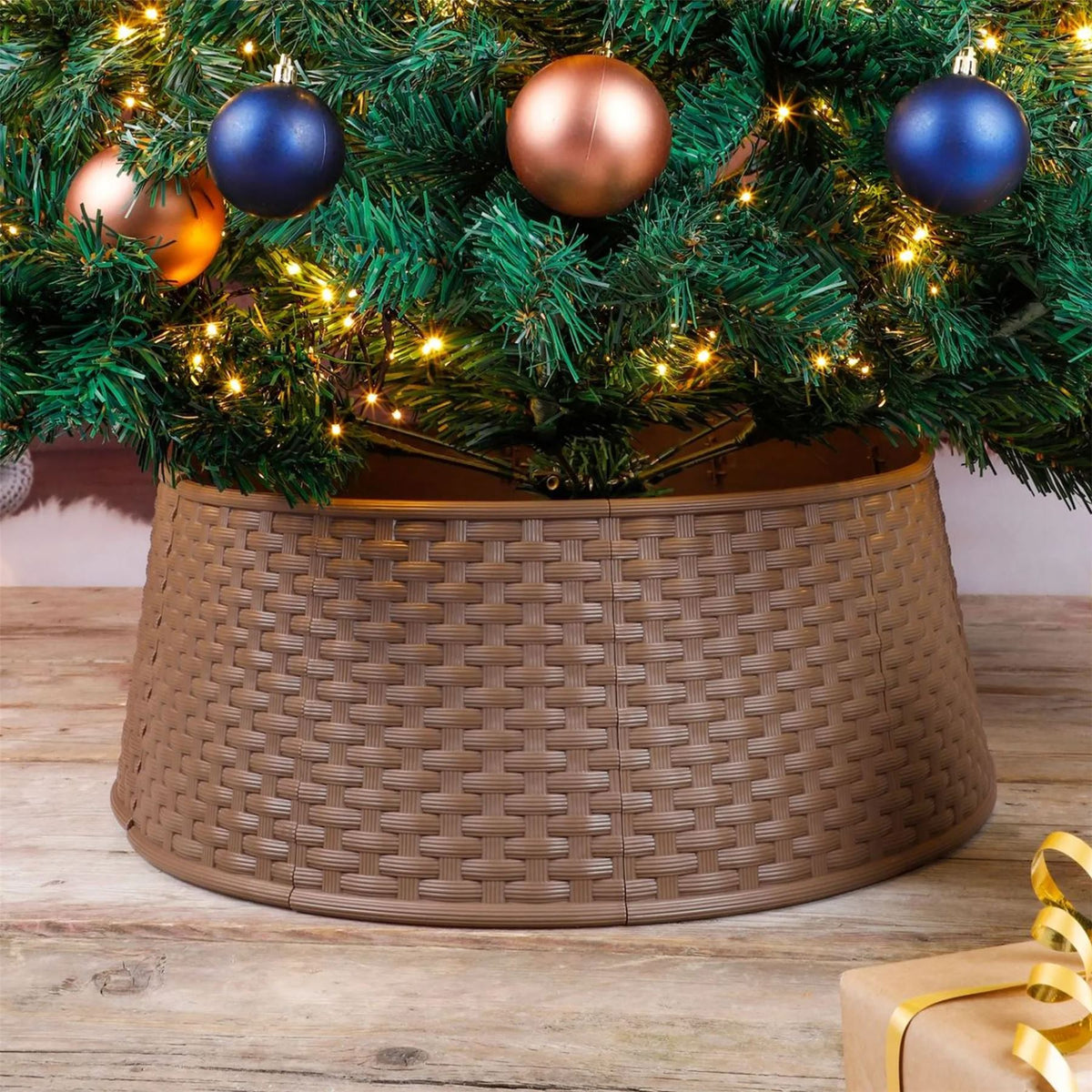 Brown GEEZY Christmas tree skirt with a basket weave pattern sits beneath a decorated Christmas tree