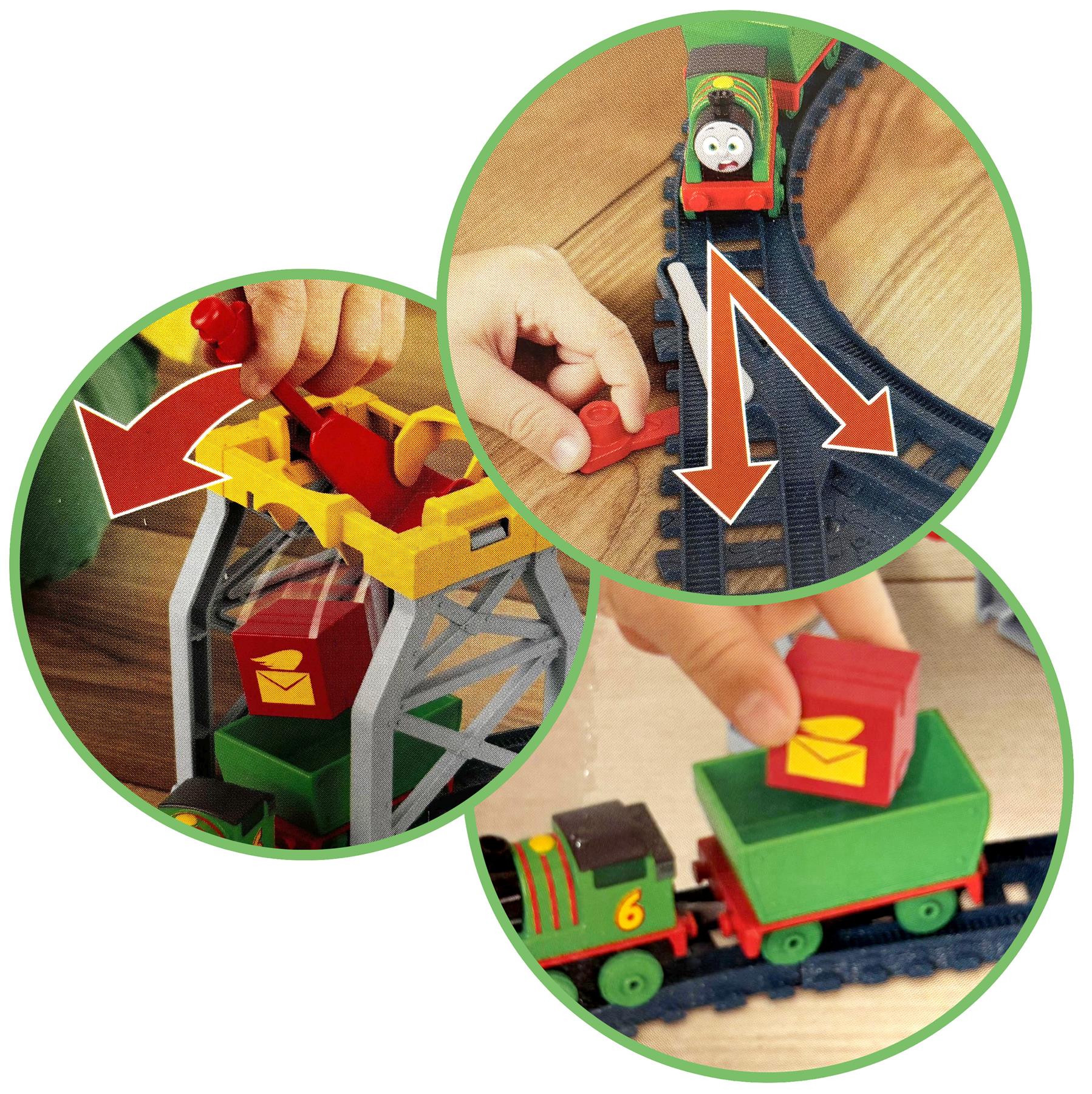Train tracks demonstrate cargo drop mechanisms, curved rails, and connecting train cars.