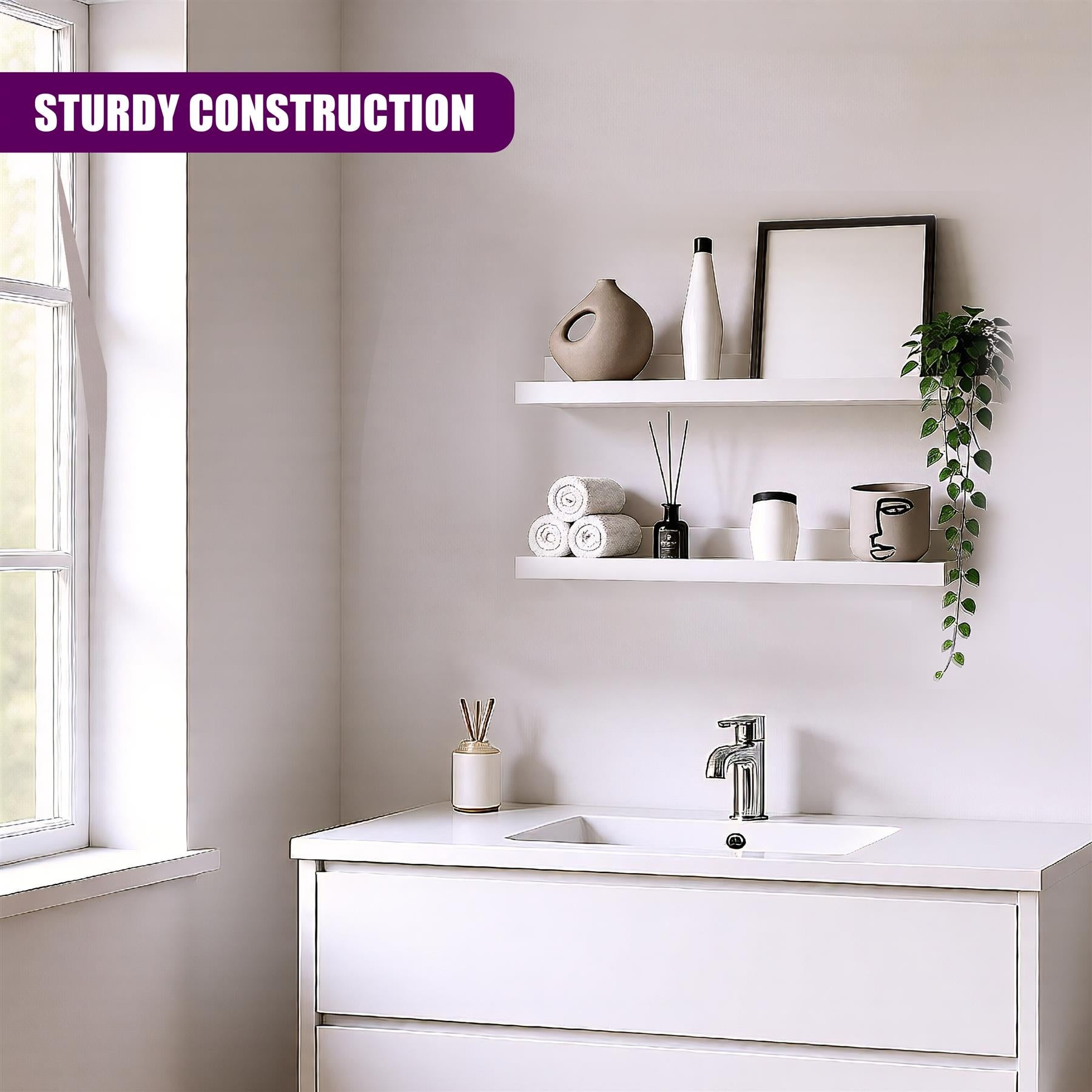 A modern, white bathroom sink with a single, low-lying faucet. The sink is surrounded by a white, low-profile cabinet with a flat, rectangular top. The faucet is a simple, minimalist design with a small, round handle. The sink is positioned in front of a large, white mirror. - The Magic Toy Shop