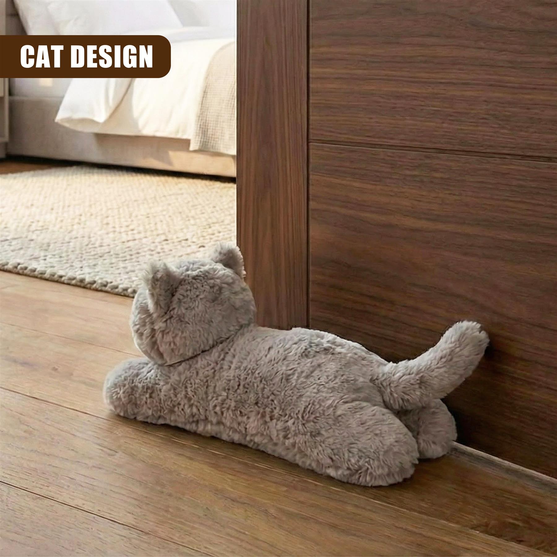 A plush cat resting against a wall, designed to look like a real cat lying down. With wooden flooring and simple furnishings in the background. - The Magic Toy Shop