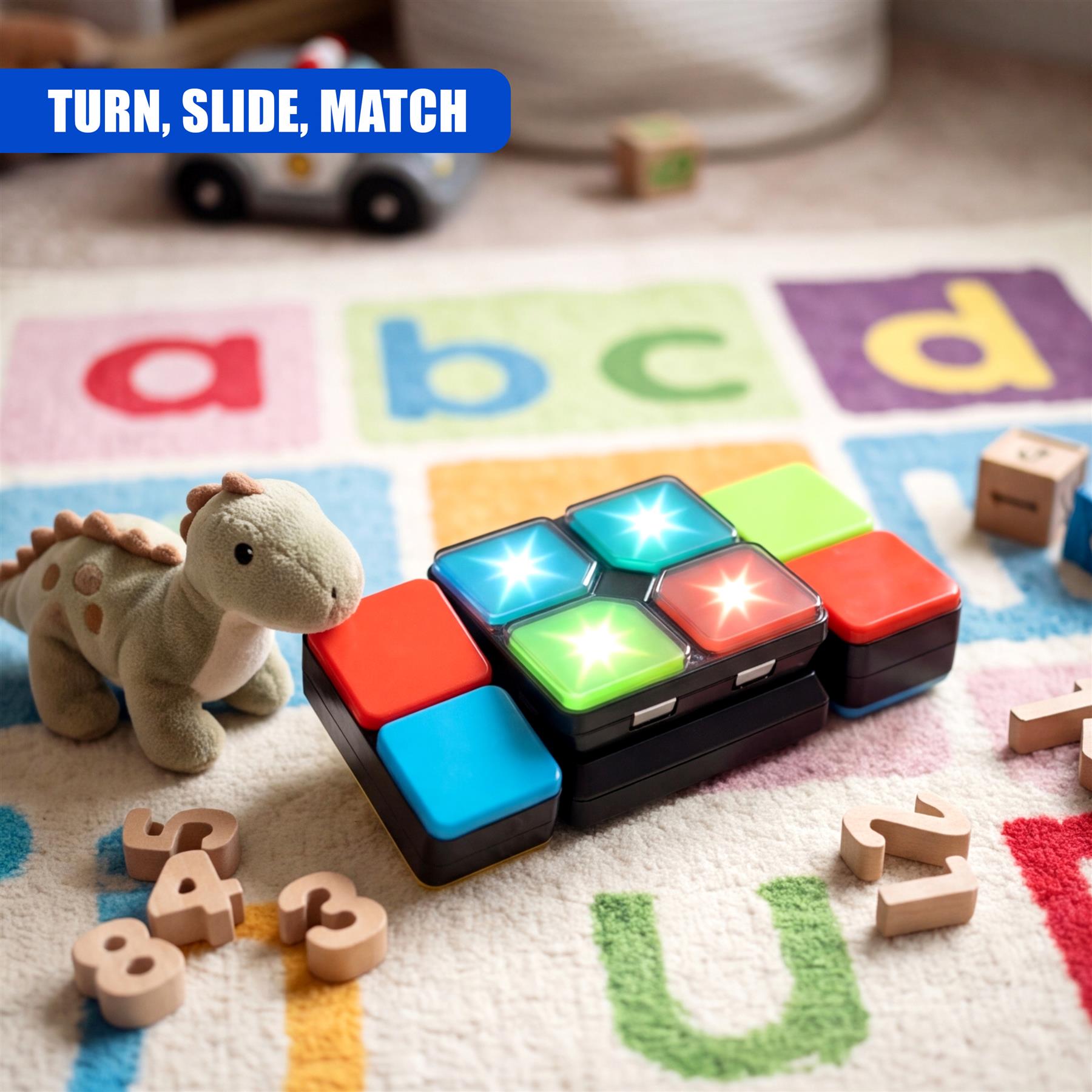 Colorful light-up cube game rests on a patterned surface next to wooden letter and number blocks.