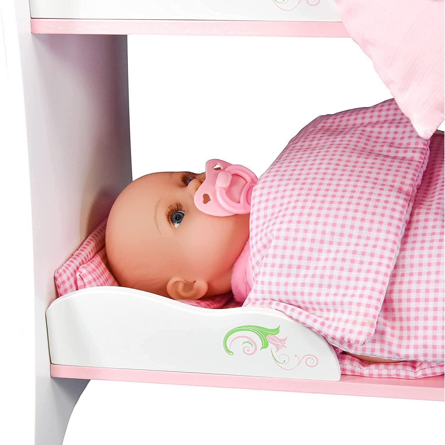 "Doll bed with baby in a pink blanket, resting on one bunk while another is empty." - The Magic Toy Shop
