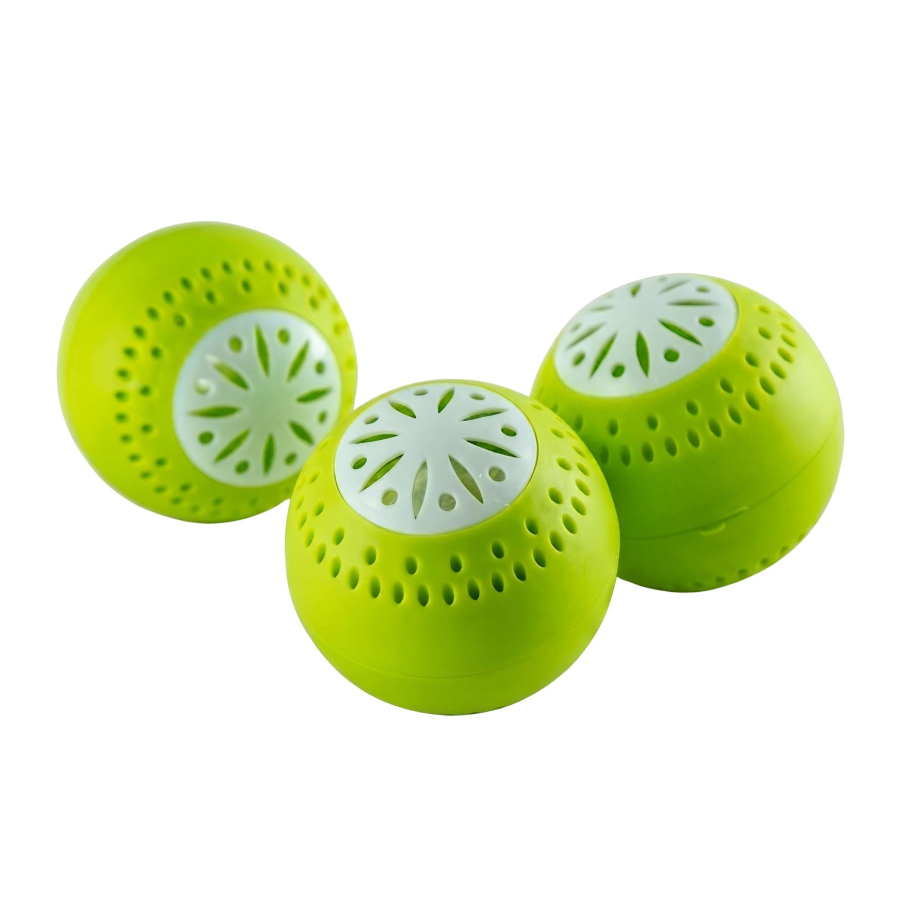 Three bright lime-green circular deodoriser balls with white inner sections.