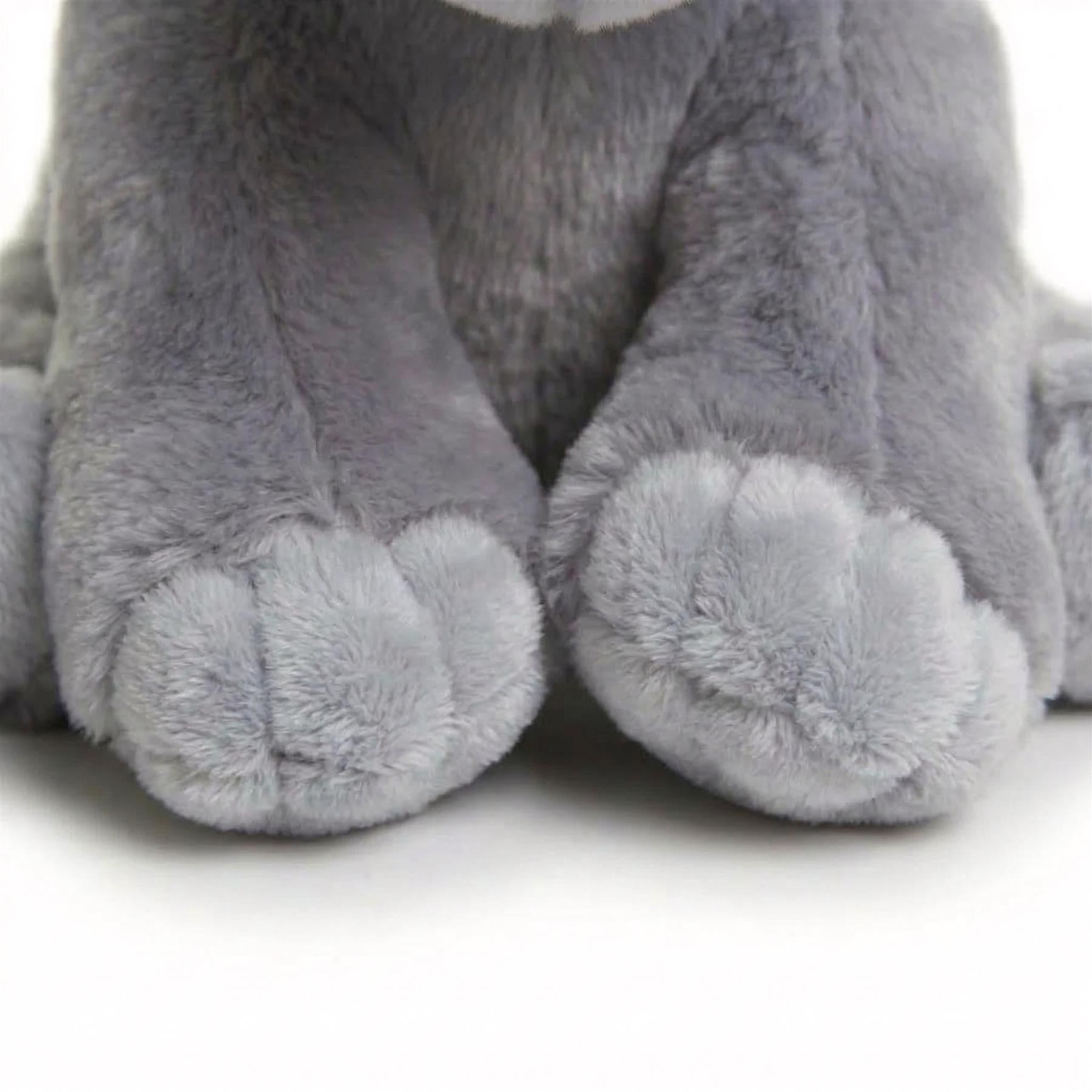 Close-up view of the plush elephant's light gray, padded paws and fuzzy fabric texture.