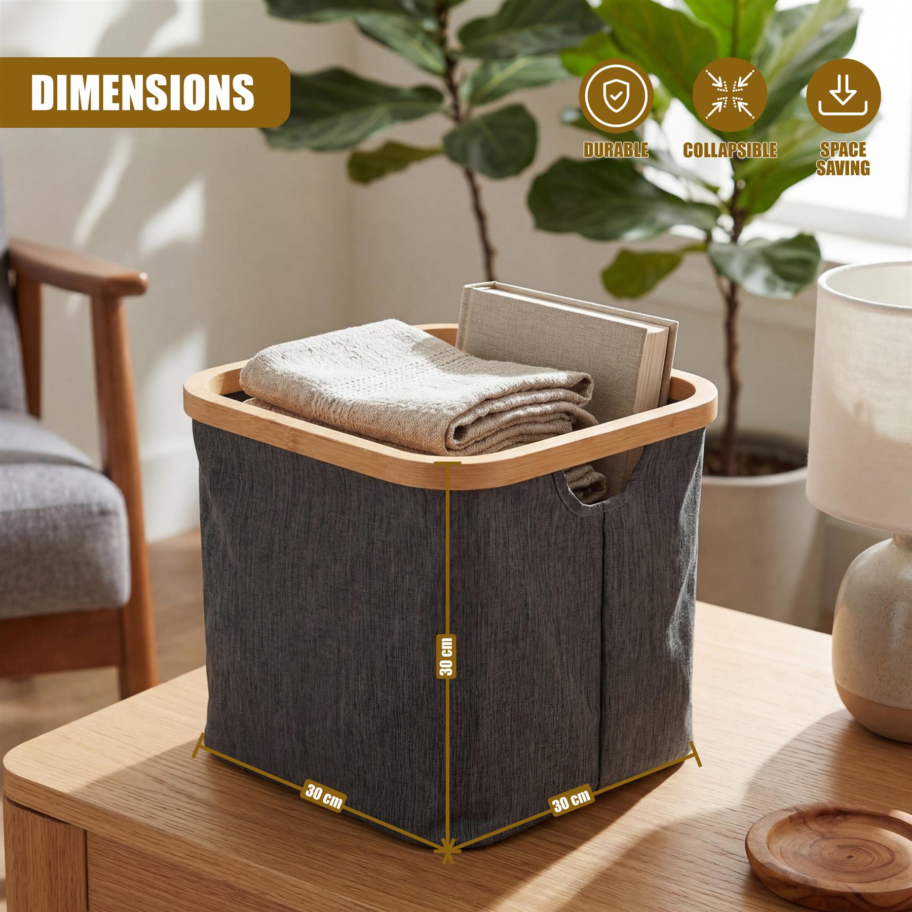 Fabric laundry hamper on a table displaying its 30 cm by 30 cm dimensions.