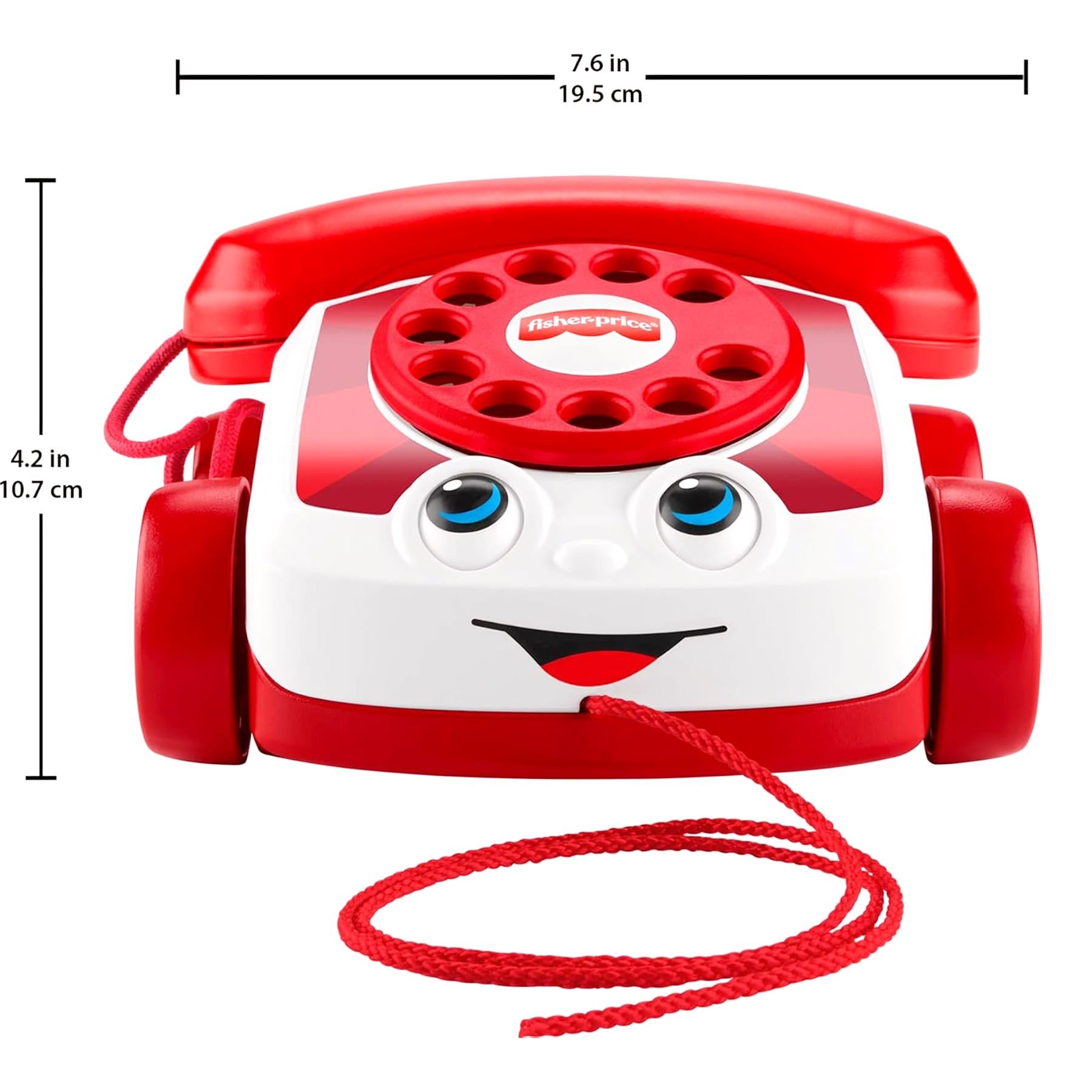Red and white plastic toy phone featuring a rotary dial, smiley face, and attached red cord.
