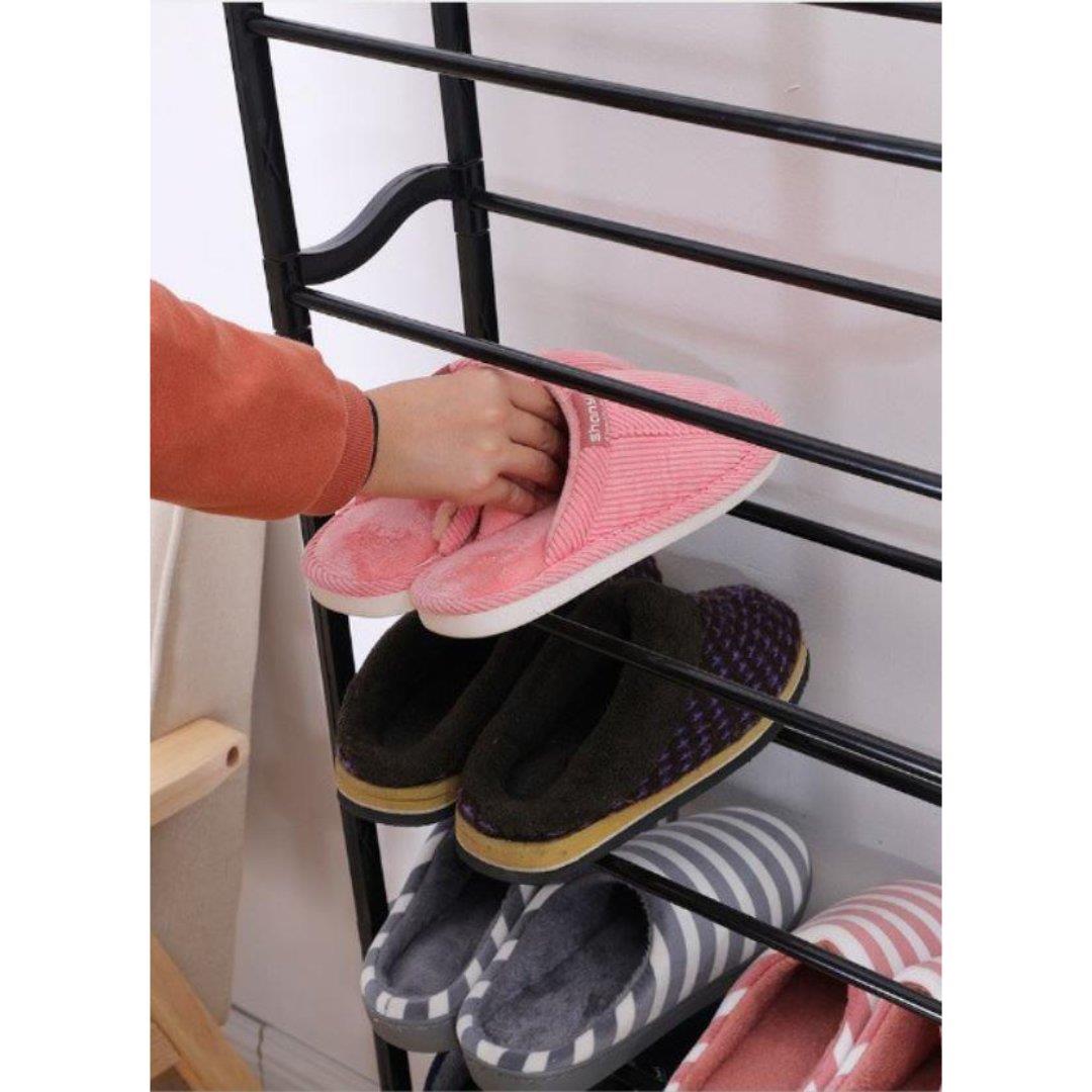 A shoe rack with a pair of slippers on it.