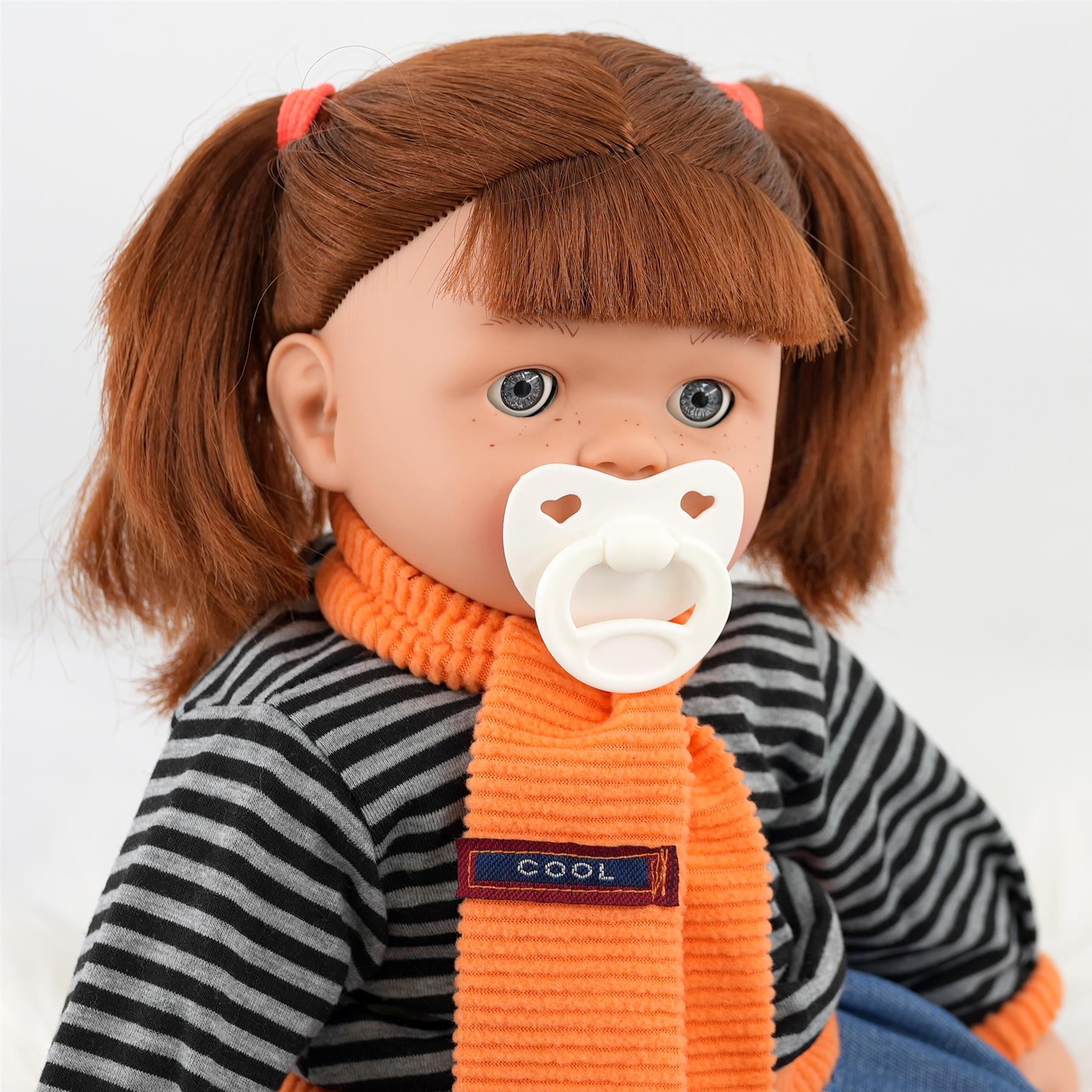 Doll with cheap orange hair