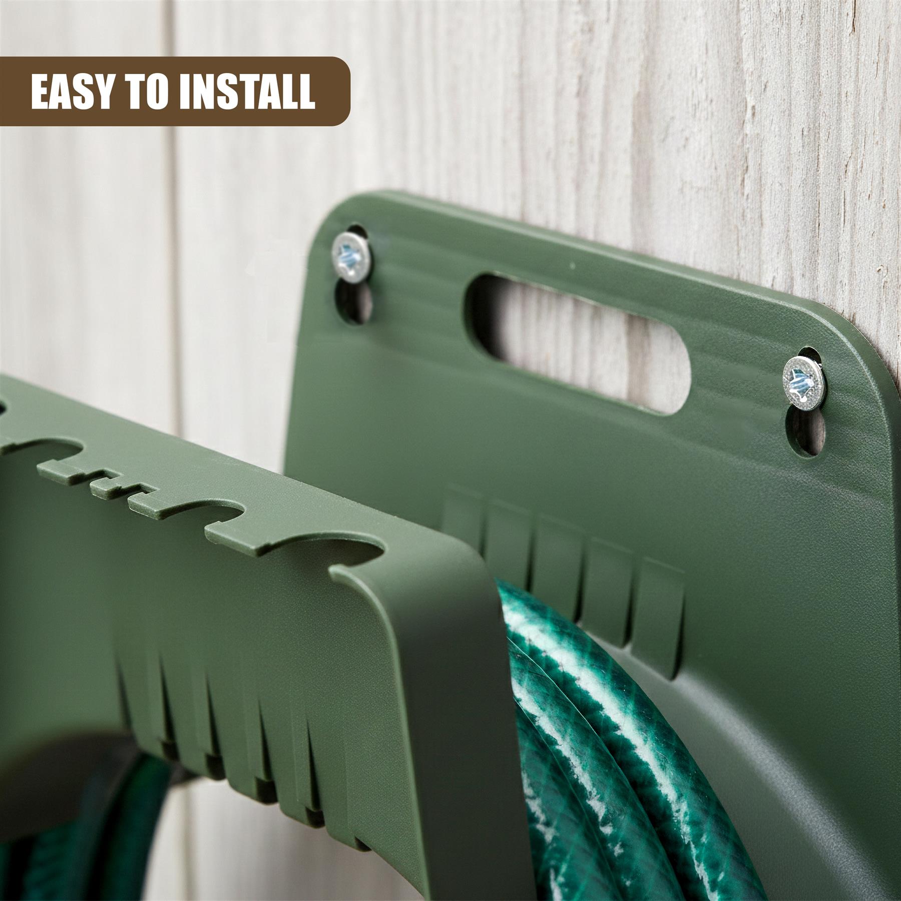 Green wall-mounted hose holder with slots for coiling and supporting a garden hose.