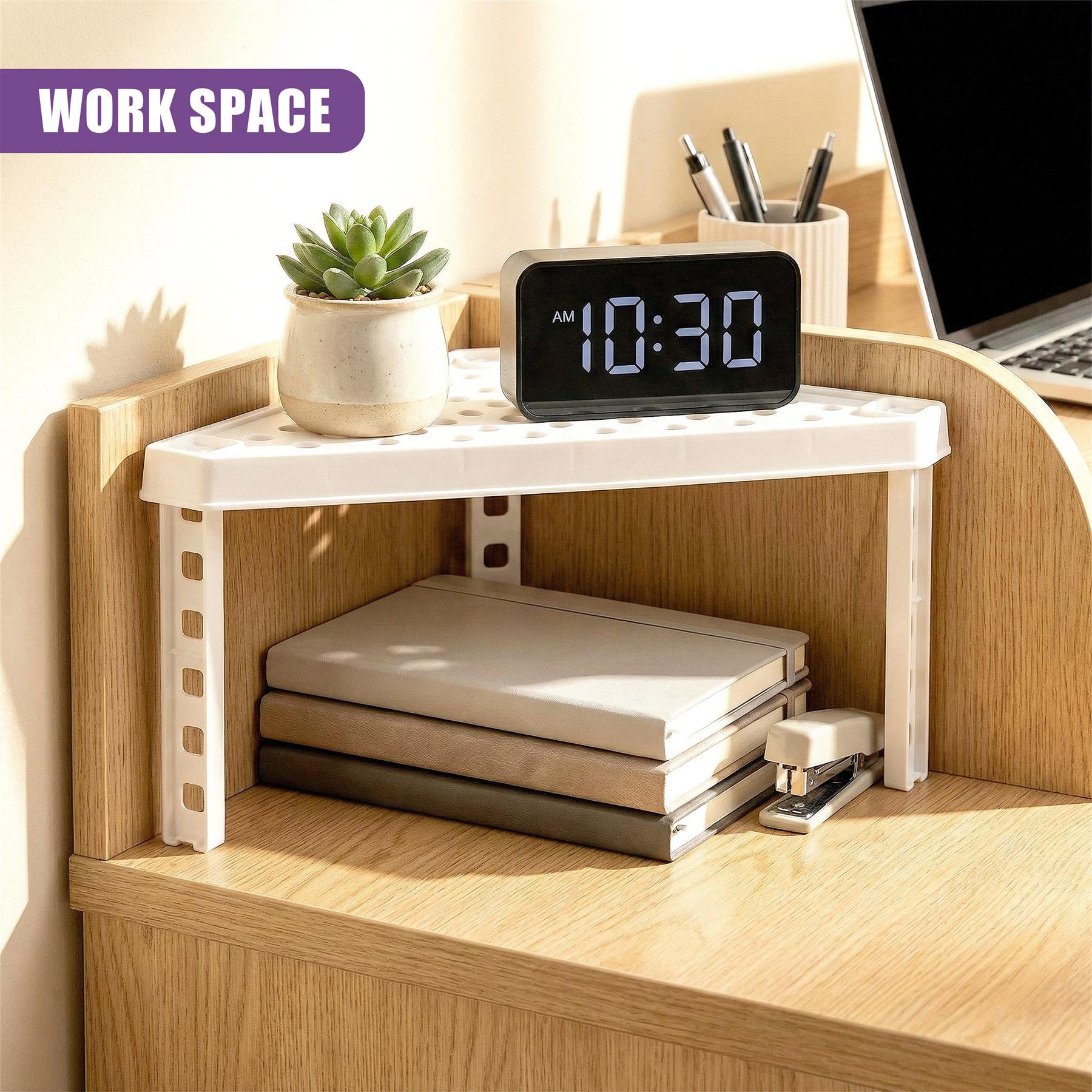 White corner shelf insert mounted on wood desk, organizing supplies, a clock, and notebooks.