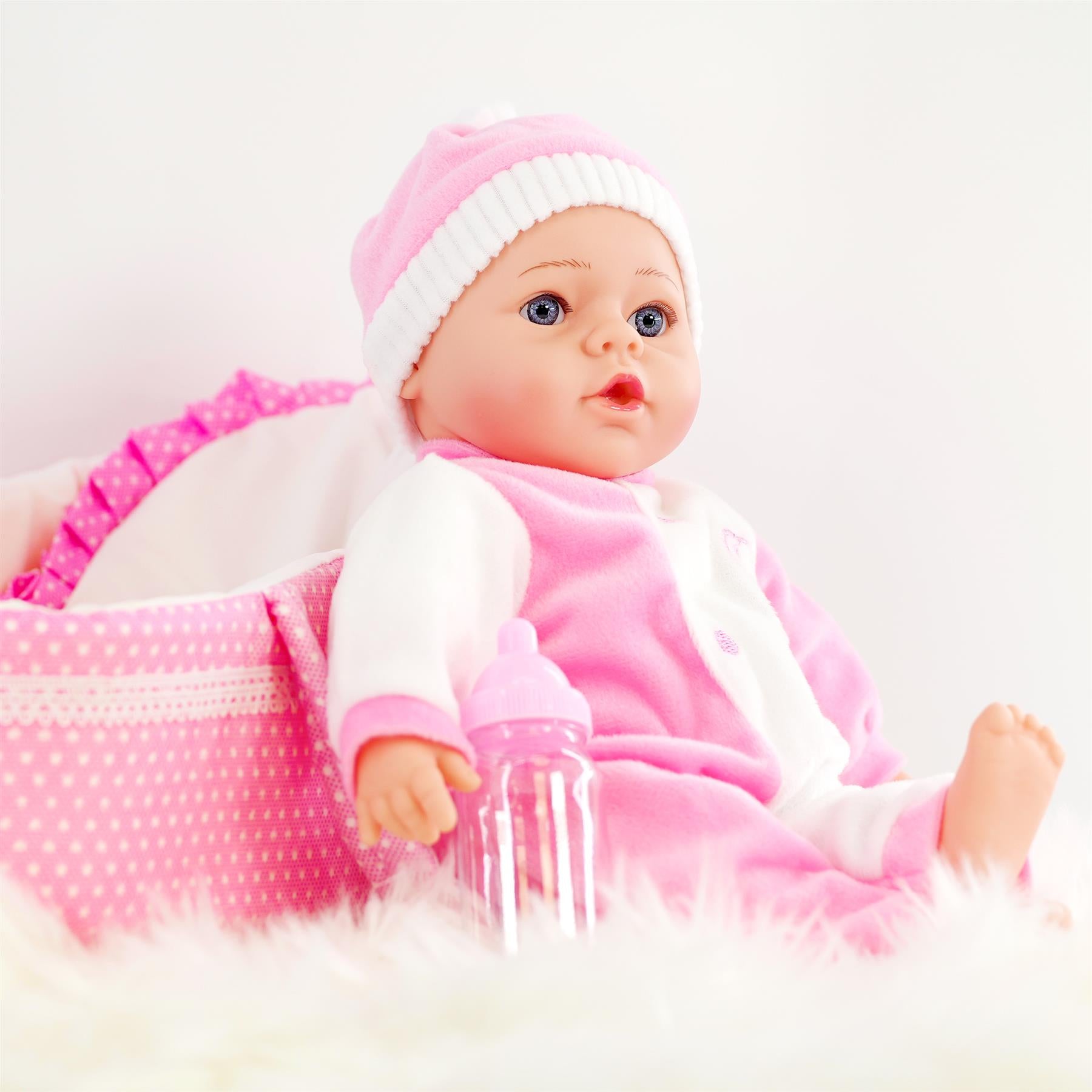 The Magic Toy Shop BiBi Baby Doll in Carry Cot (38 cm / 15")