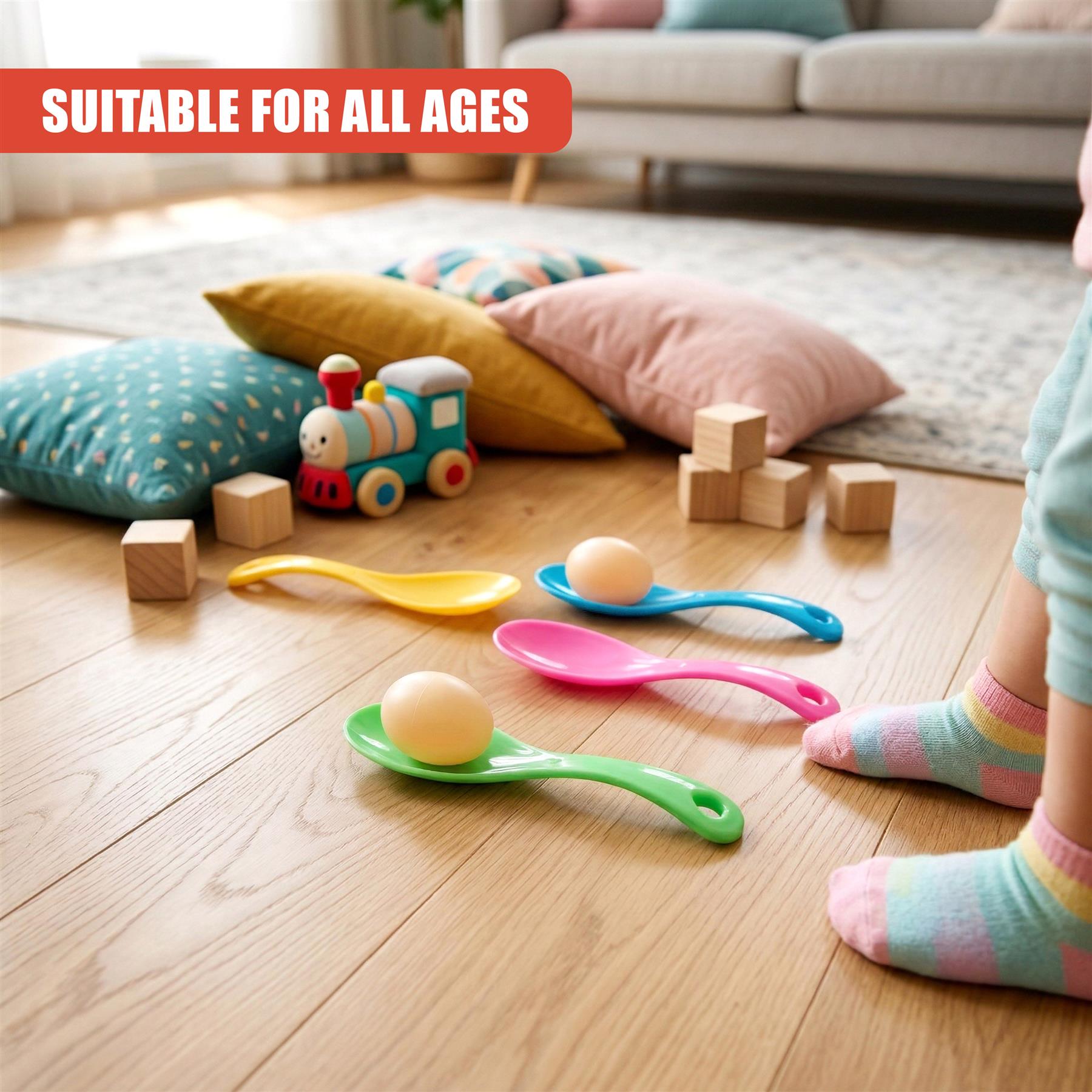 A toy race setup featuring colored spoons, eggs, and a small train on a wooden floor.