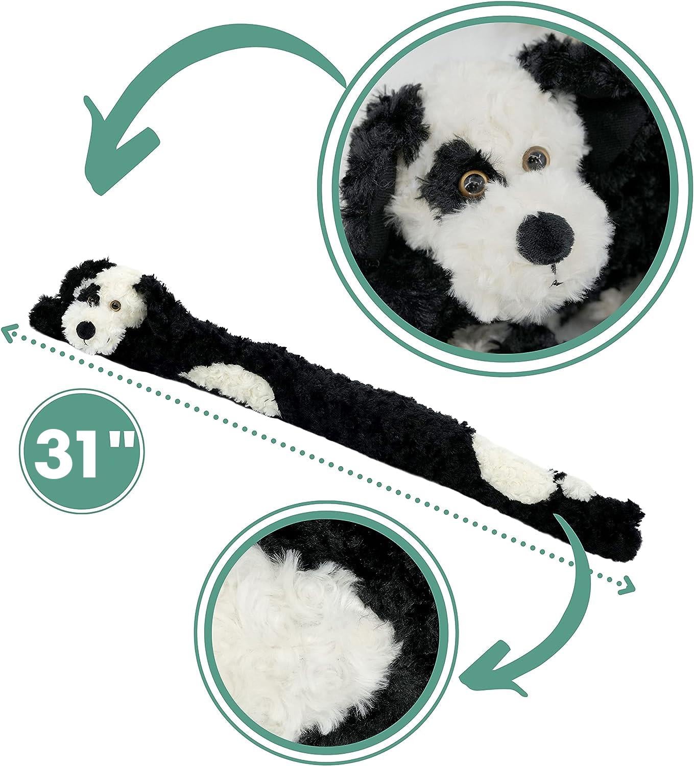 A 31-inch novelty black dog draught excluder designed to block drafts at doors, featuring a plush, friendly-looking dog with a predominantly black body and a white belly and face. Ideal for adding charm and warmth to your home. Available at themagictoyshop.