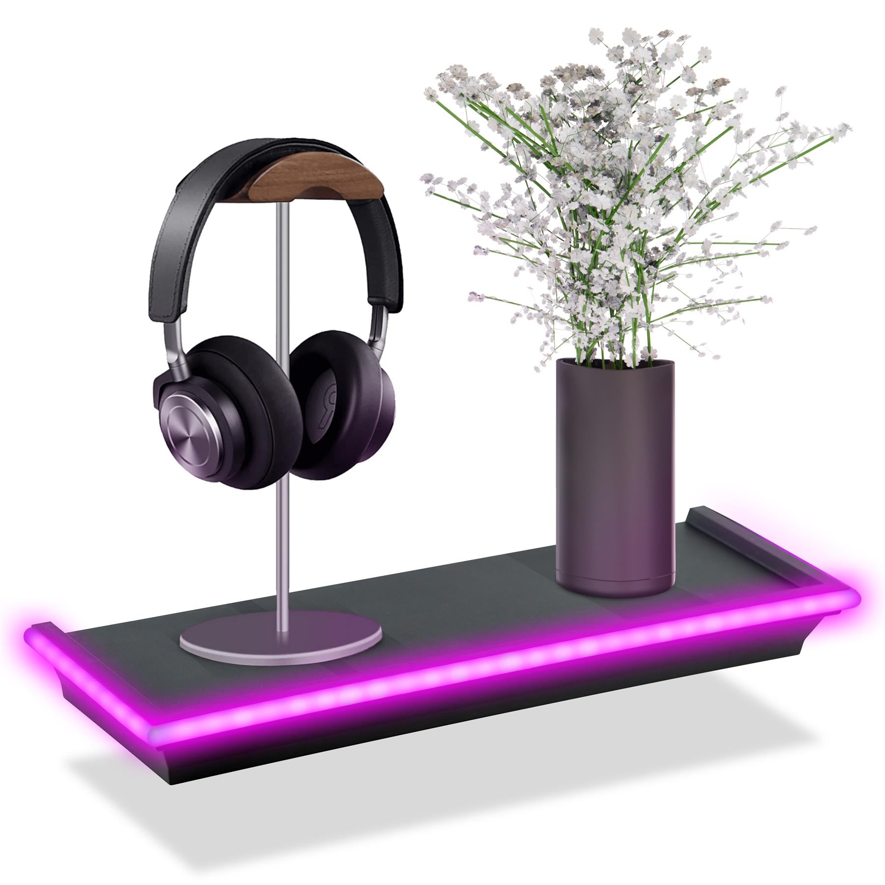 A sleek black floating shelf featuring LED neon lights along the edge, displaying a pair of black headphones on a stylish stand and a modern vase with white faux flowers. Ideal for organizing your space while adding a decorative touch. Perfect for music lovers and home décor enthusiasts. themagictoyshop.