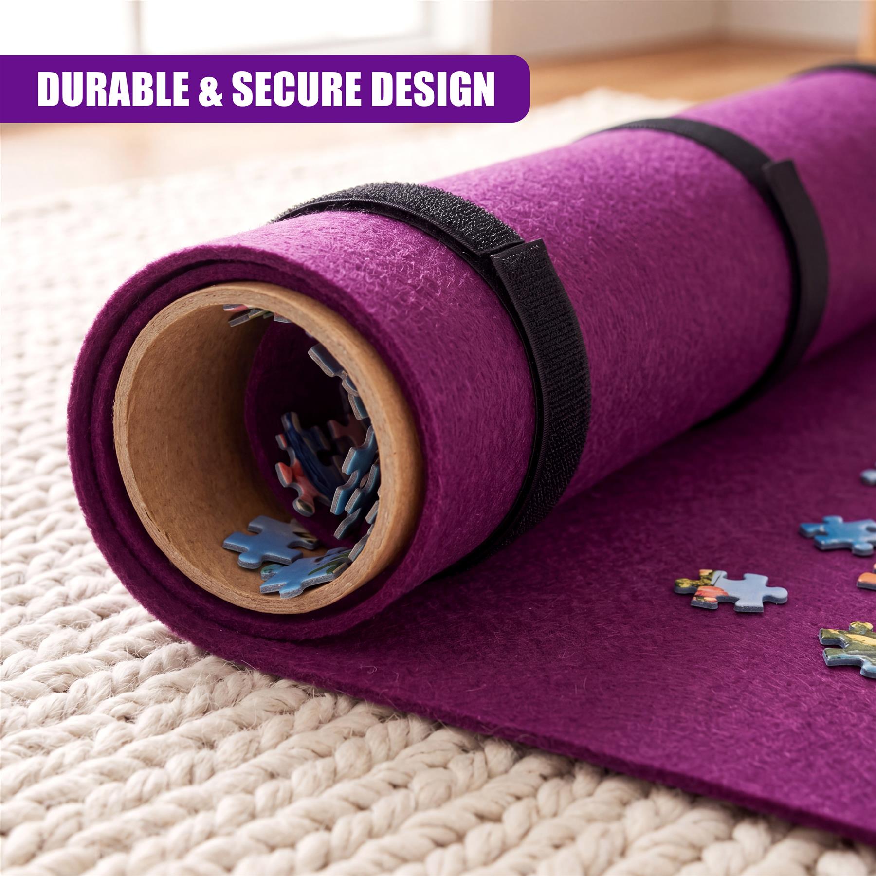 Purple rolled jigsaw mat containing scattered puzzle pieces and a black securing band.