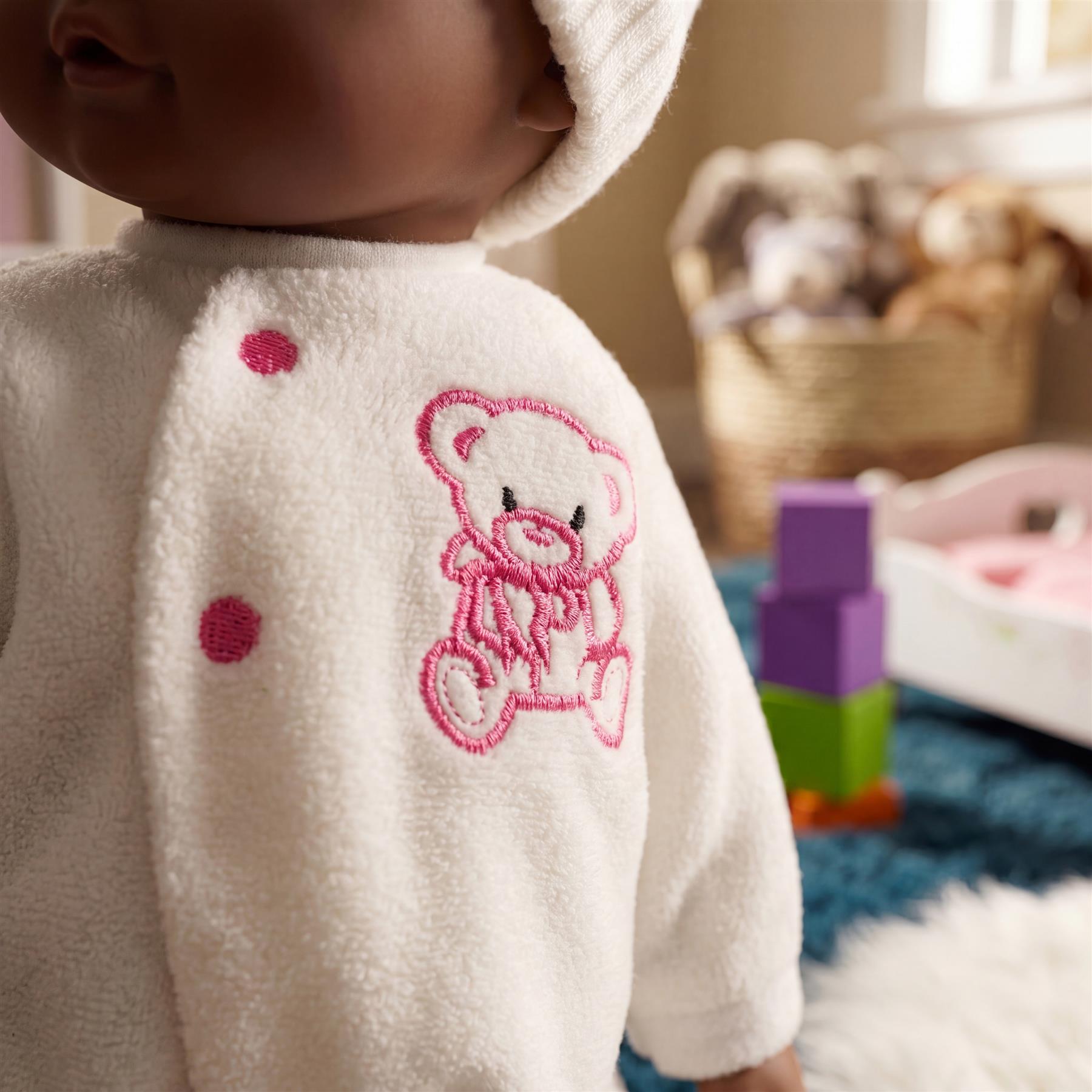 Black fabric doll from BiBI brand lying down; measuring approximately 40 centimeters long.