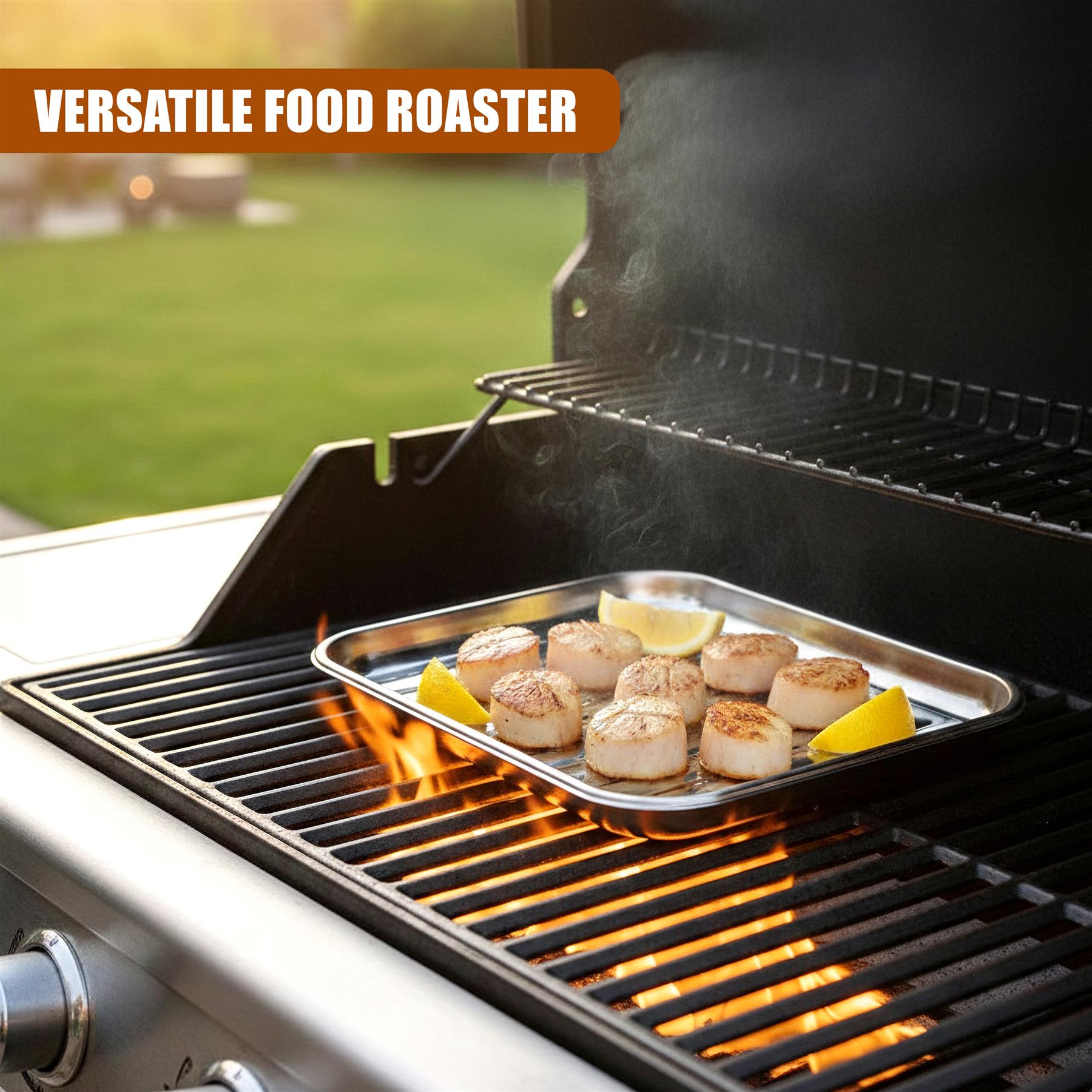 Cooked scallops and lemon slices are arranged on a metal tray on the grill grate.