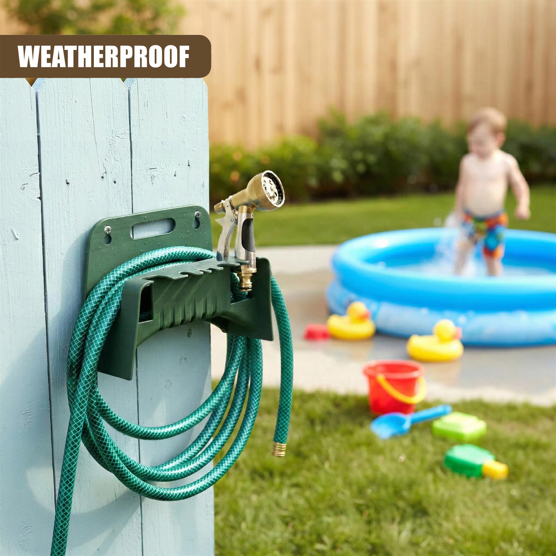 A hose mount is attached to a fence post, holding a coiled green garden hose in a backyard setting.