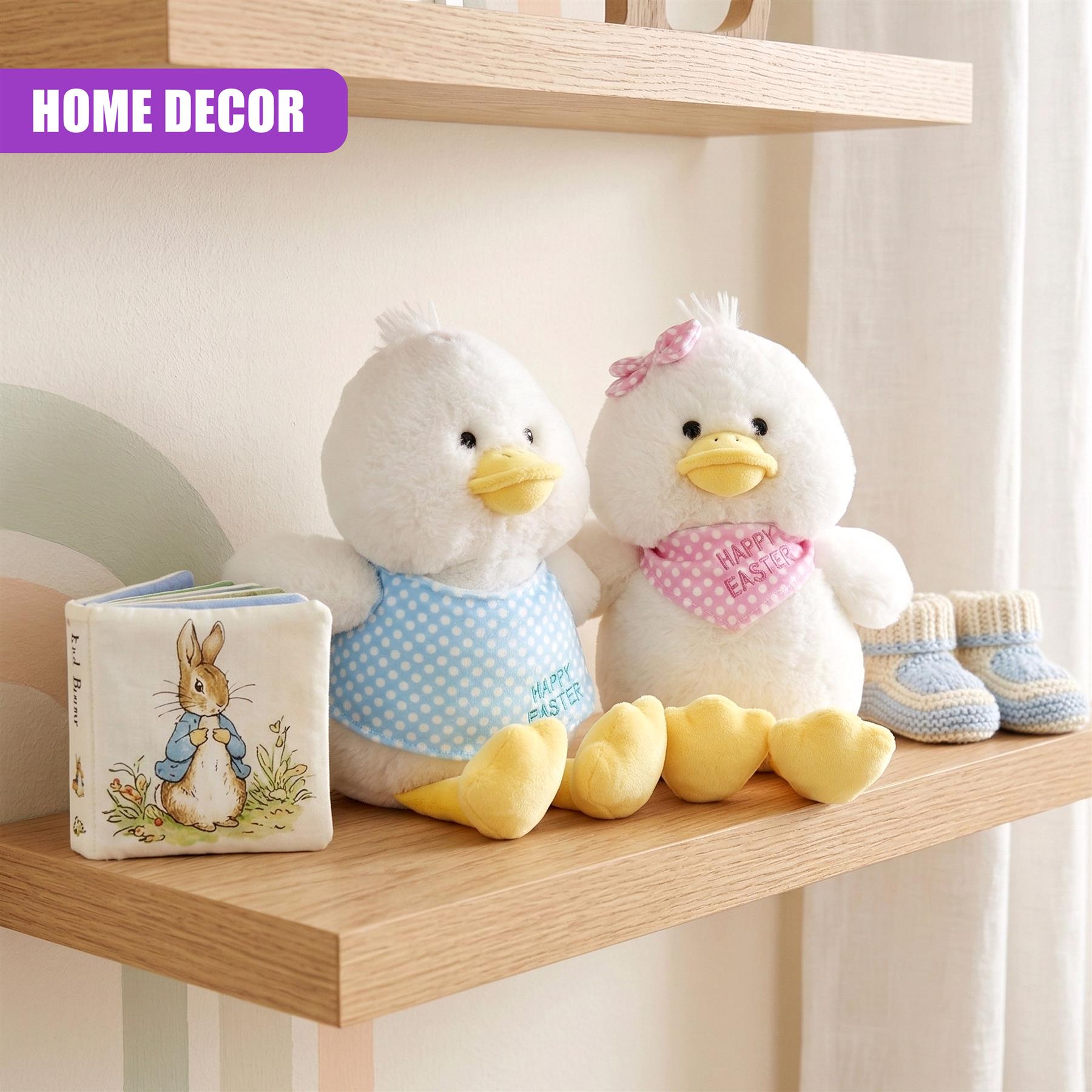 Plush Easter display on a wooden shelf includes two chicks, a bunny, and small socks.