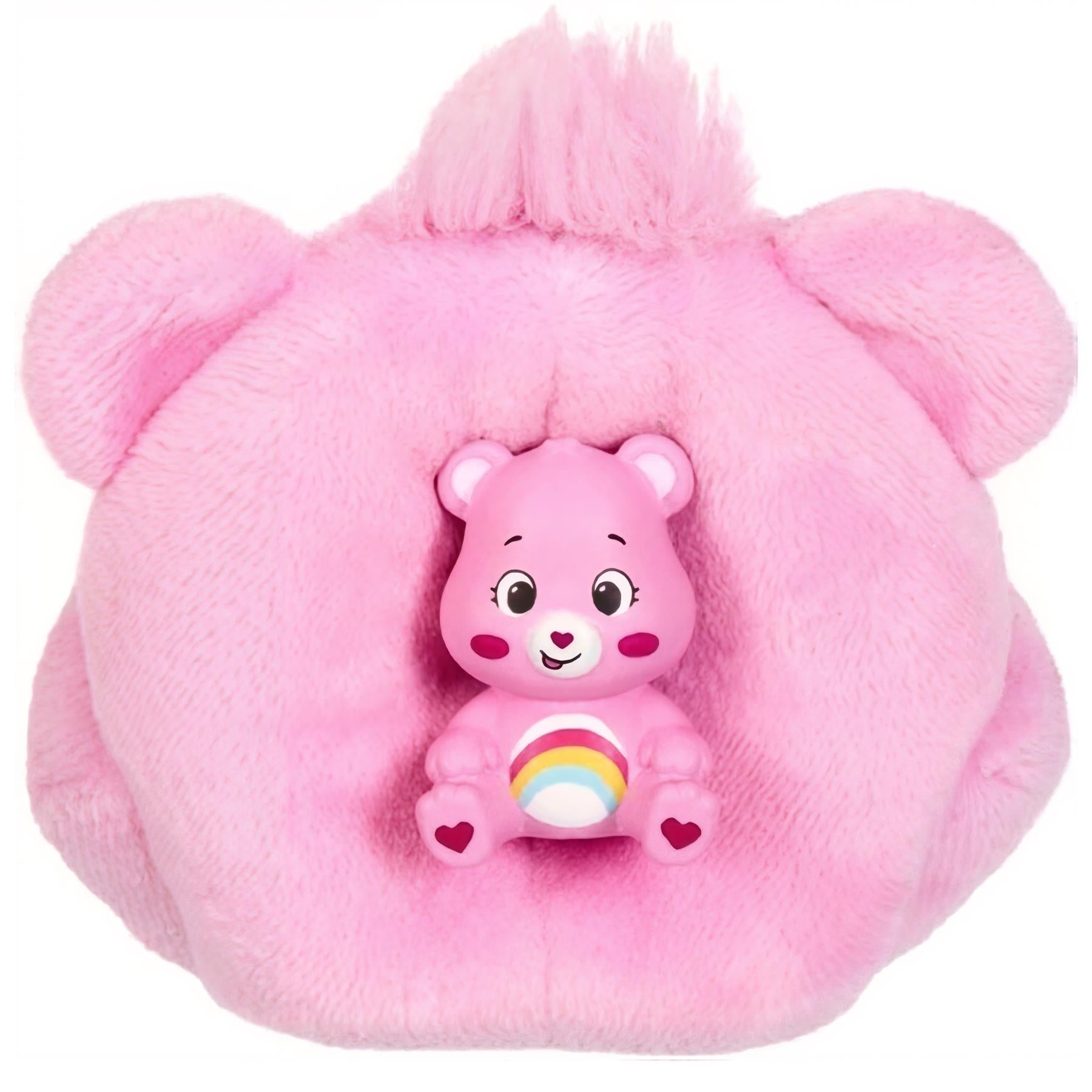 Pink plush pouch featuring a smiling pink bear toy with rainbow painted stripes.