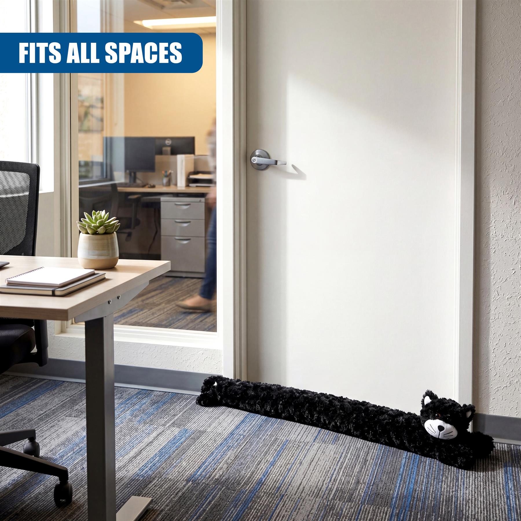 A black, textured draught excluder is positioned at the bottom of a white interior door frame.