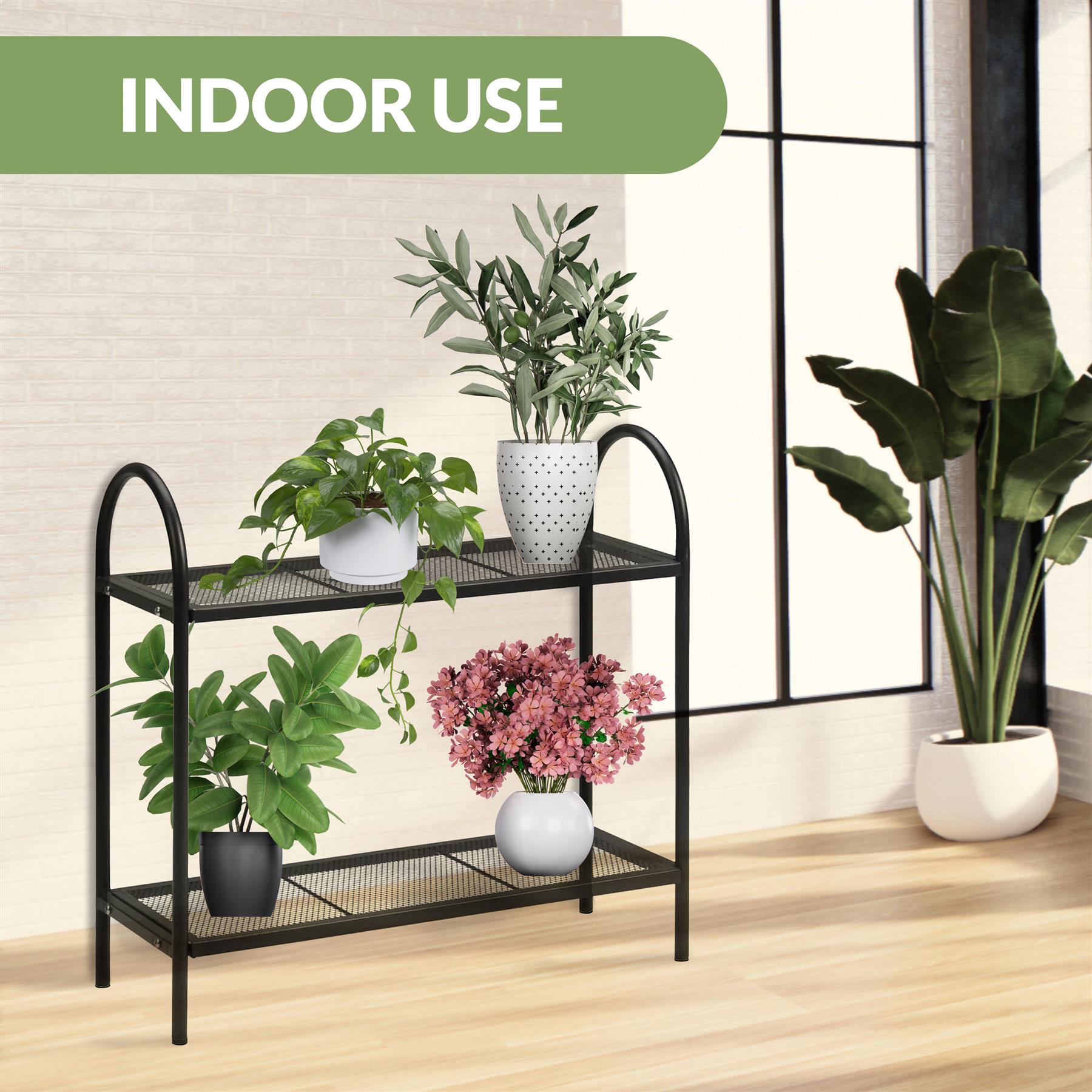 A metal plant stand, featuring two tiers for displaying plants, with a sleek design and sturdy construction. Perfect for adding greenery to any space. The Magic Toy Shop.