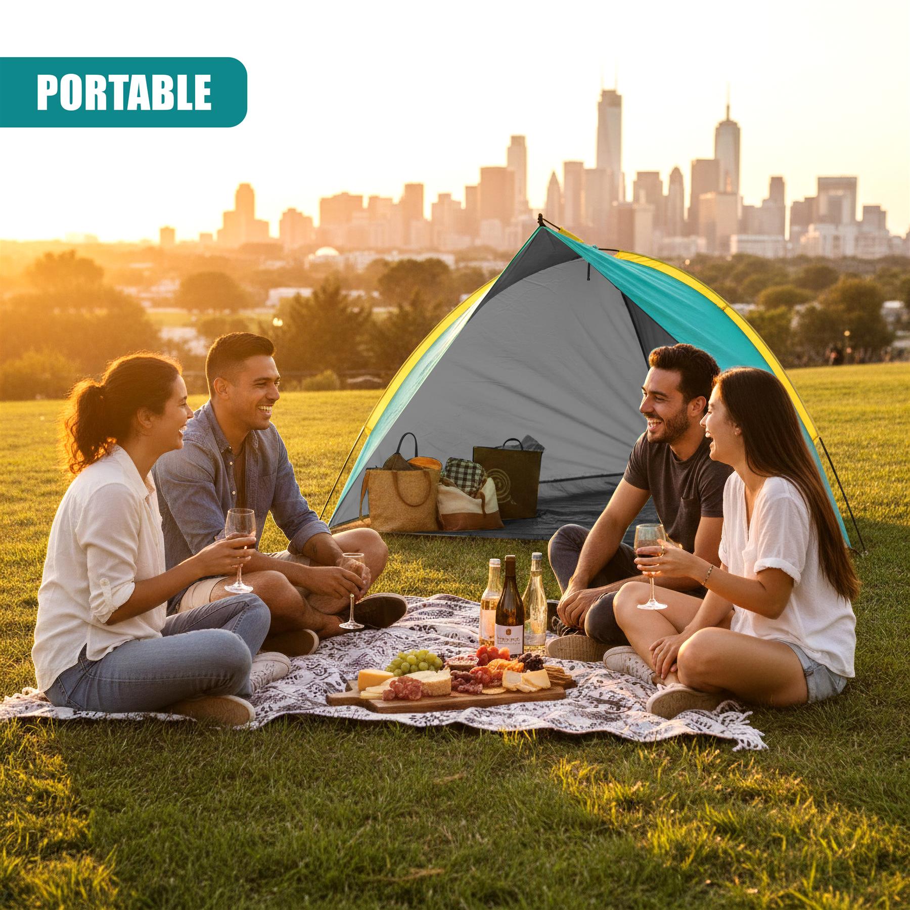 People relaxing on a blanket near a pop-up tent with a city skyline background.