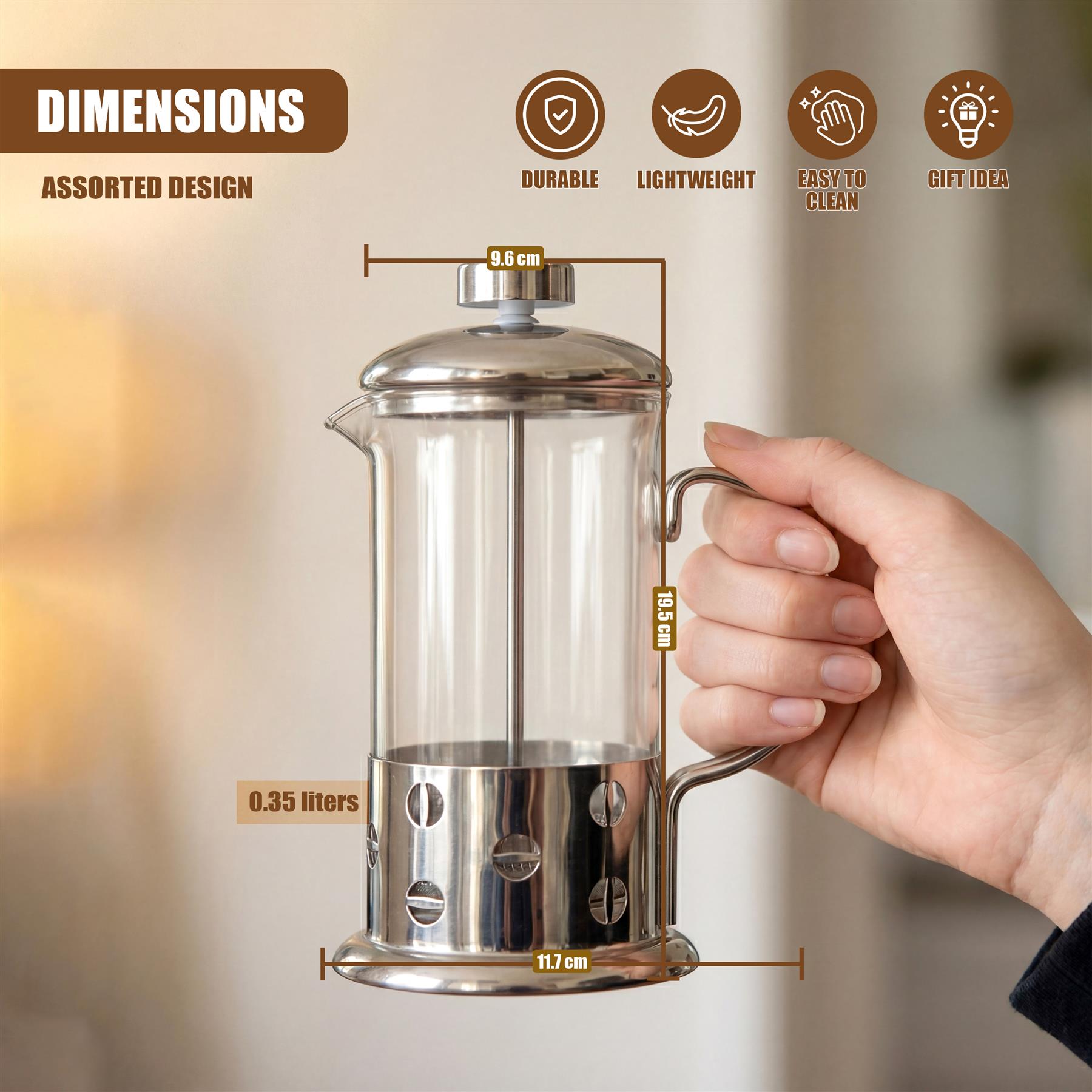 Glass and stainless steel cafetiere with dimensions visible, being held by a person's hand.