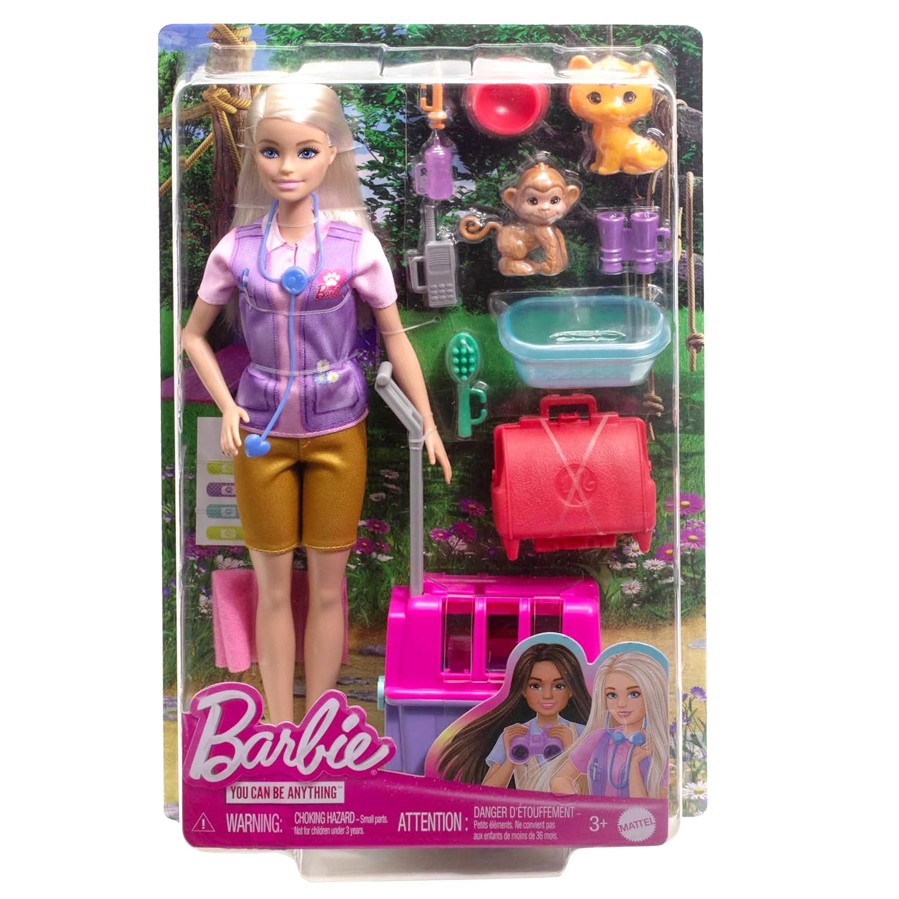 Playset shows a blonde Barbie doll, rescue gear, and various animal toys.