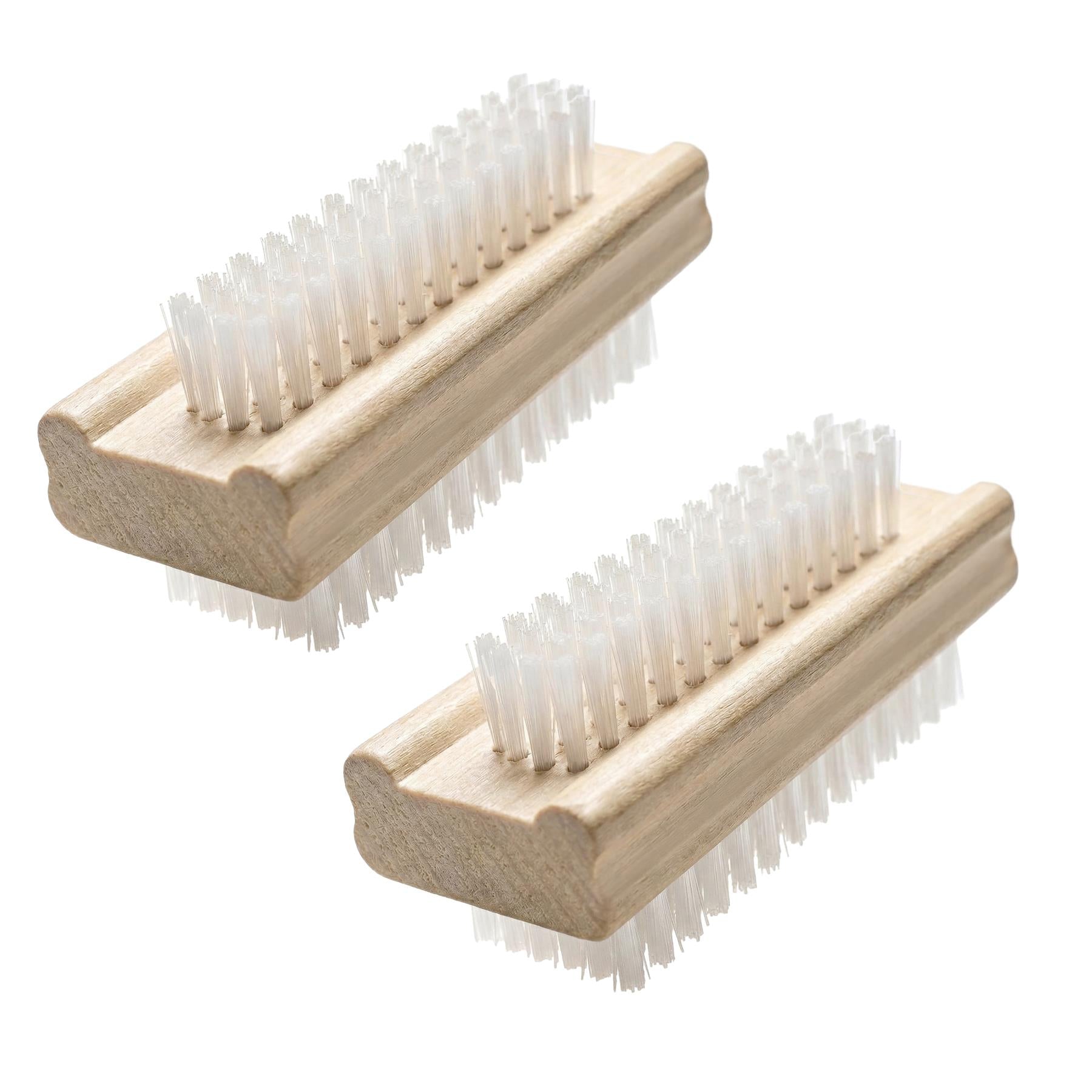 Pair of wooden manicure tools with scrub brush heads and translucent nylon bristles for nails.