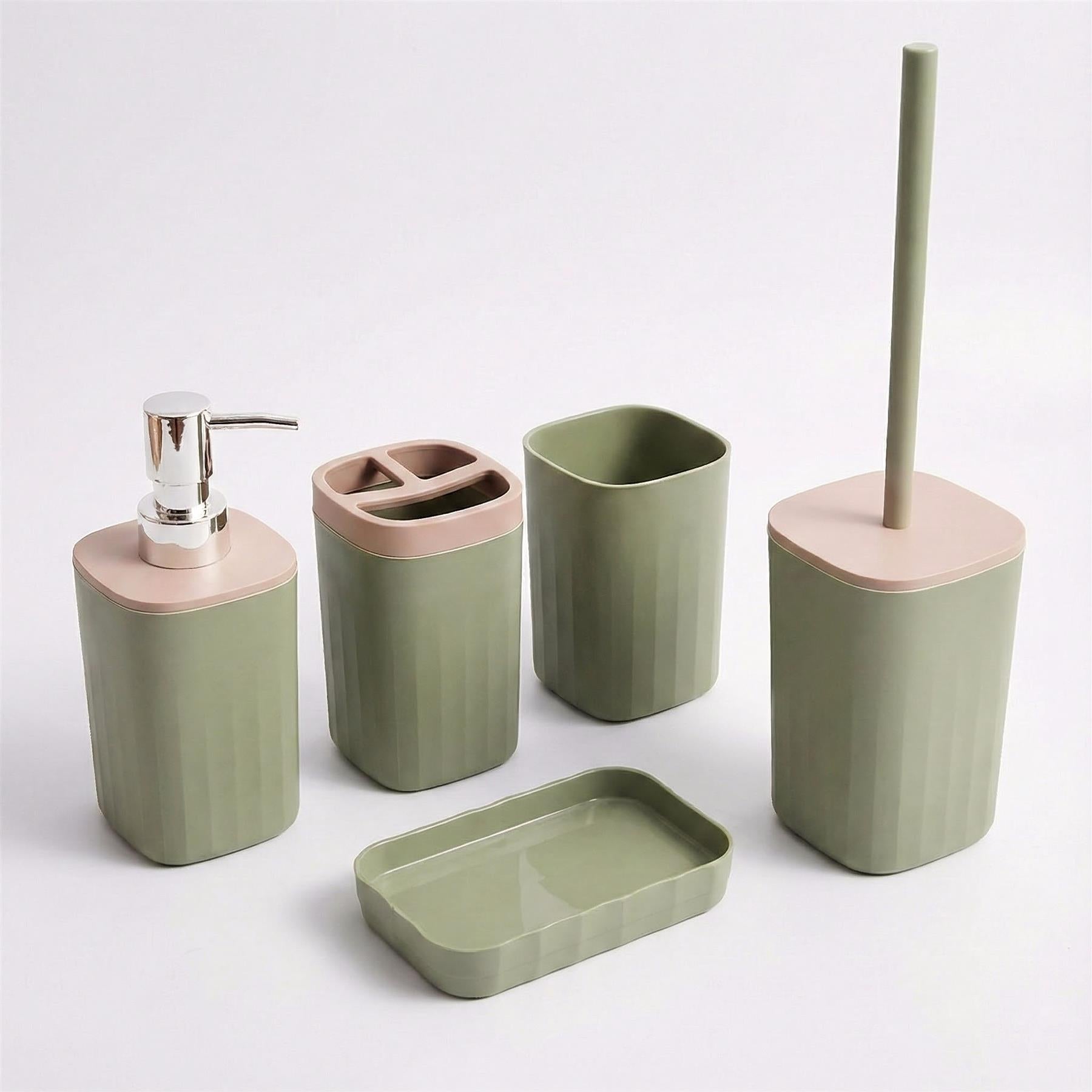 A set of green bathroom accessories: soap dispenser, toothbrush holder, tissue box, and a soap dish. - The Magic Toy Shop