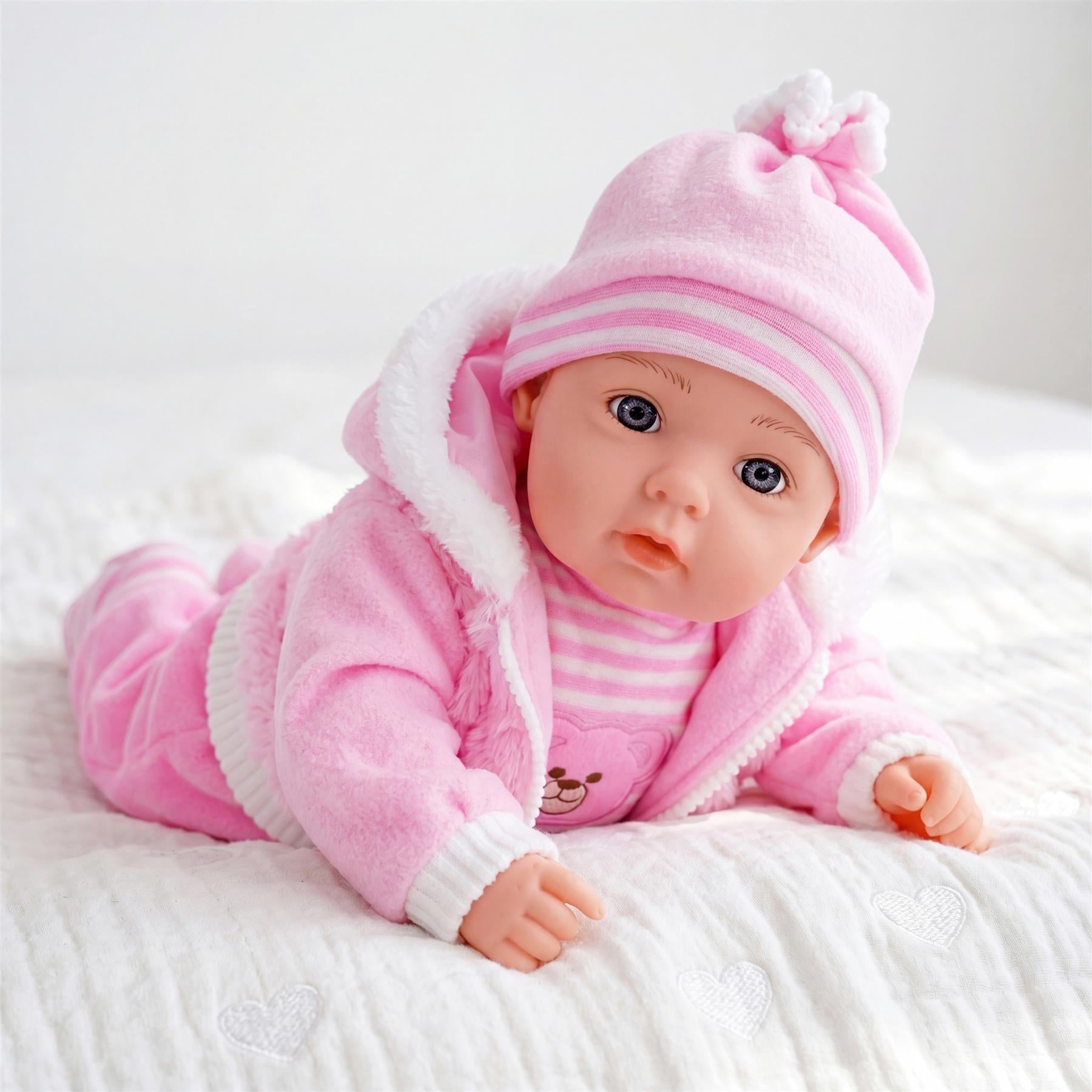 Pink plush baby doll resembling a small teddy bear figure, standing approximately fifty centimeters tall.