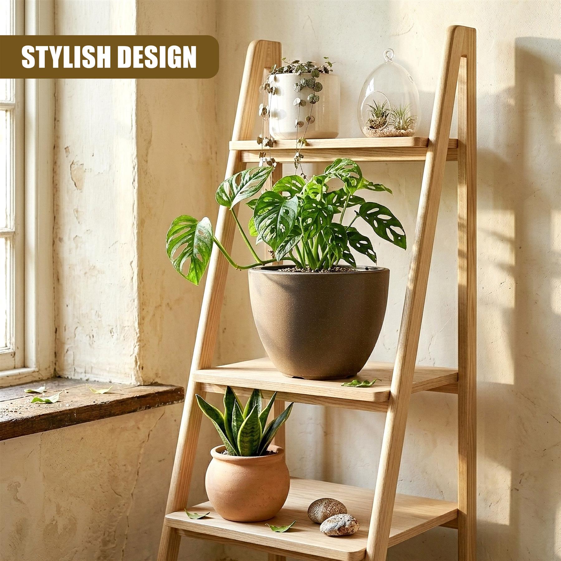 A gray oval pot displaying green foliage rests on a three-tiered wooden plant stand.