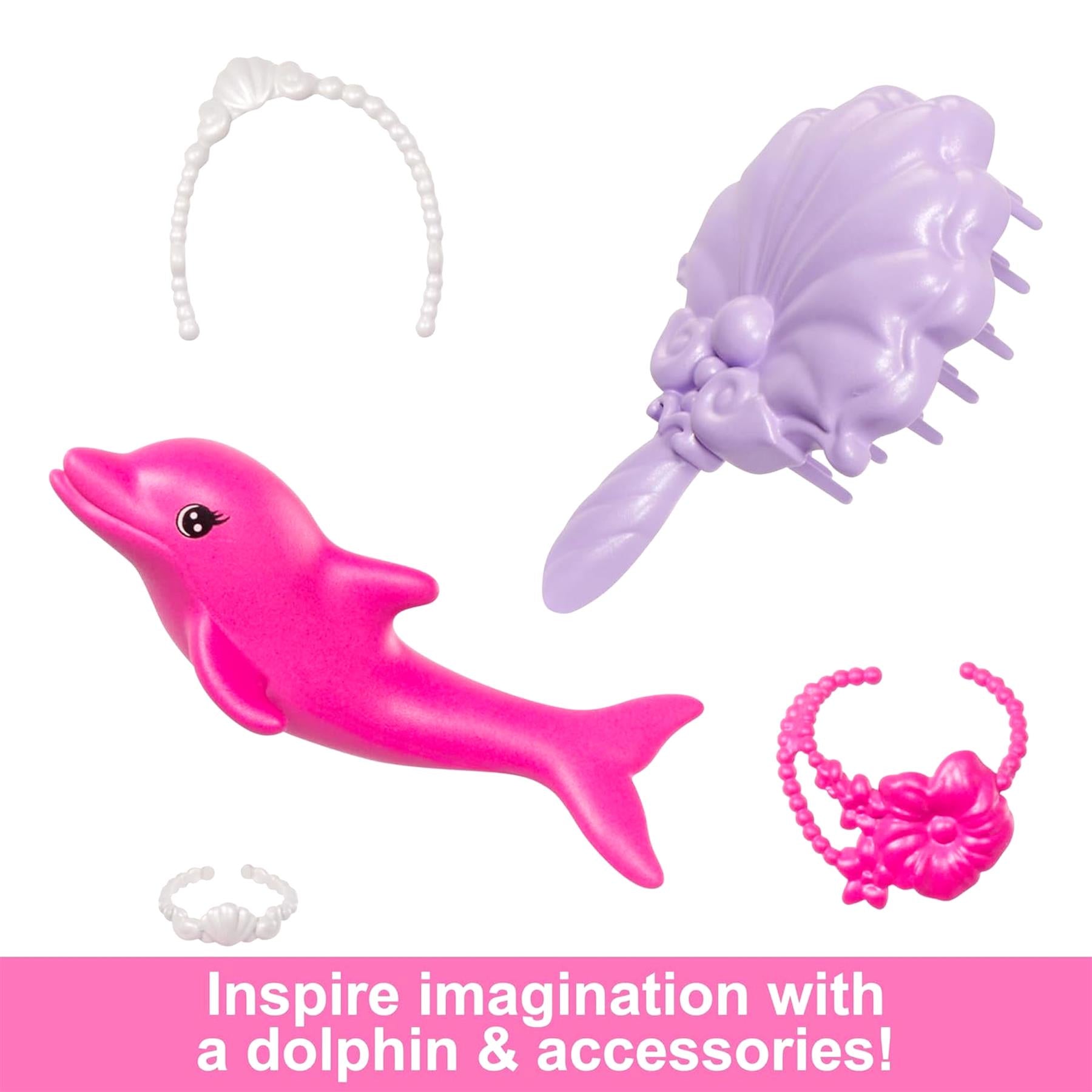 Pink dolphin toy and accessories include purple mermaid scale, white bracelet, and pink coral jewelry.