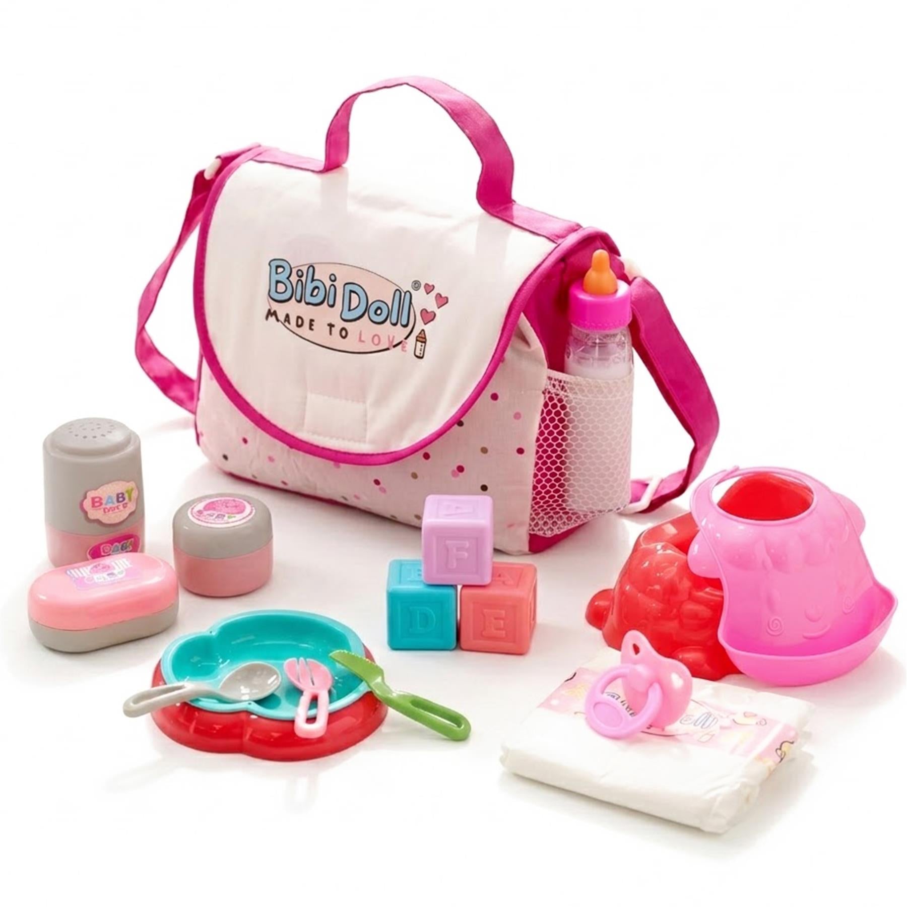 Pink changing bag with various baby accessories, including cups, blocks, bottles, and pacifier toys.