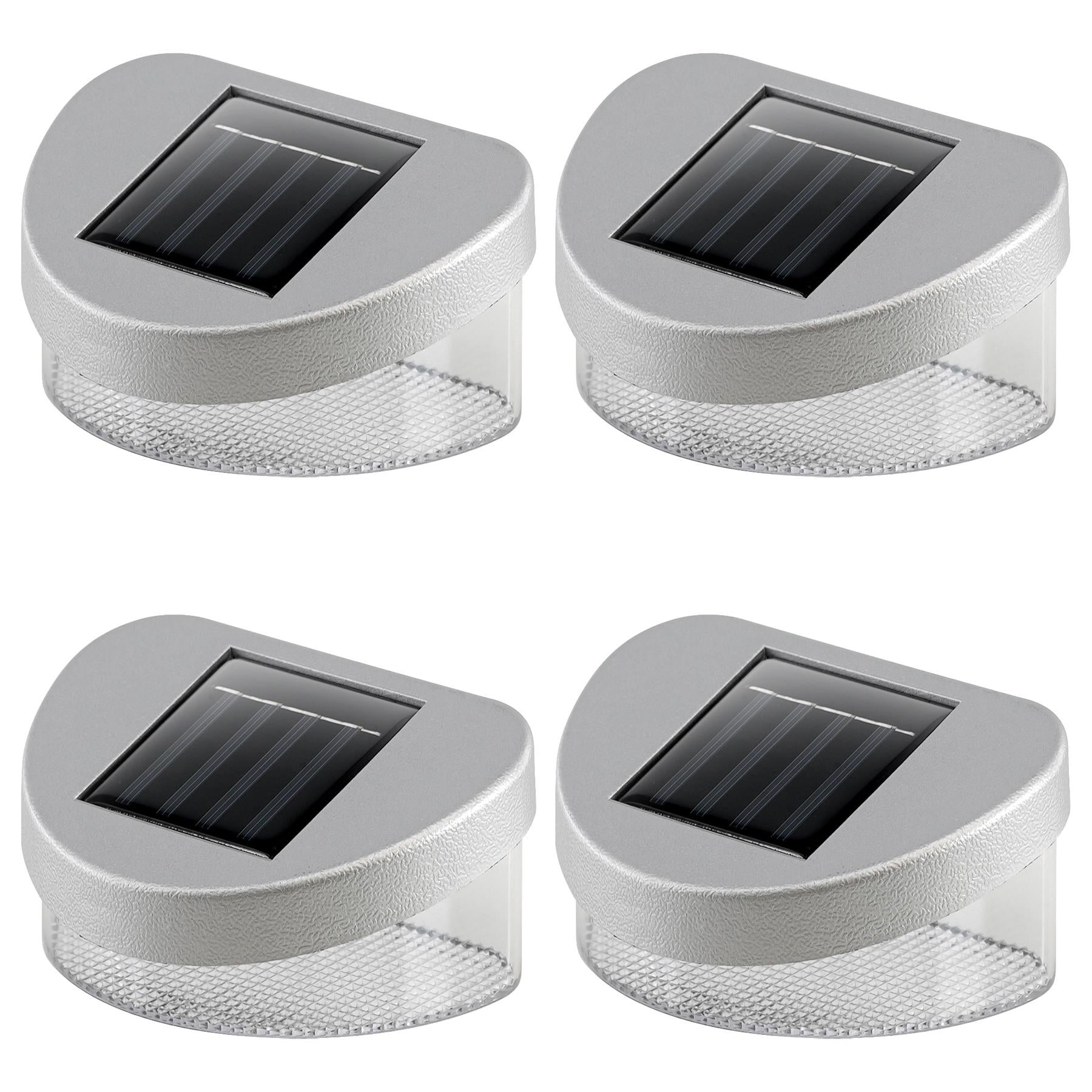 Two square outdoor solar lights with integrated panels and gray plastic bases are displayed.