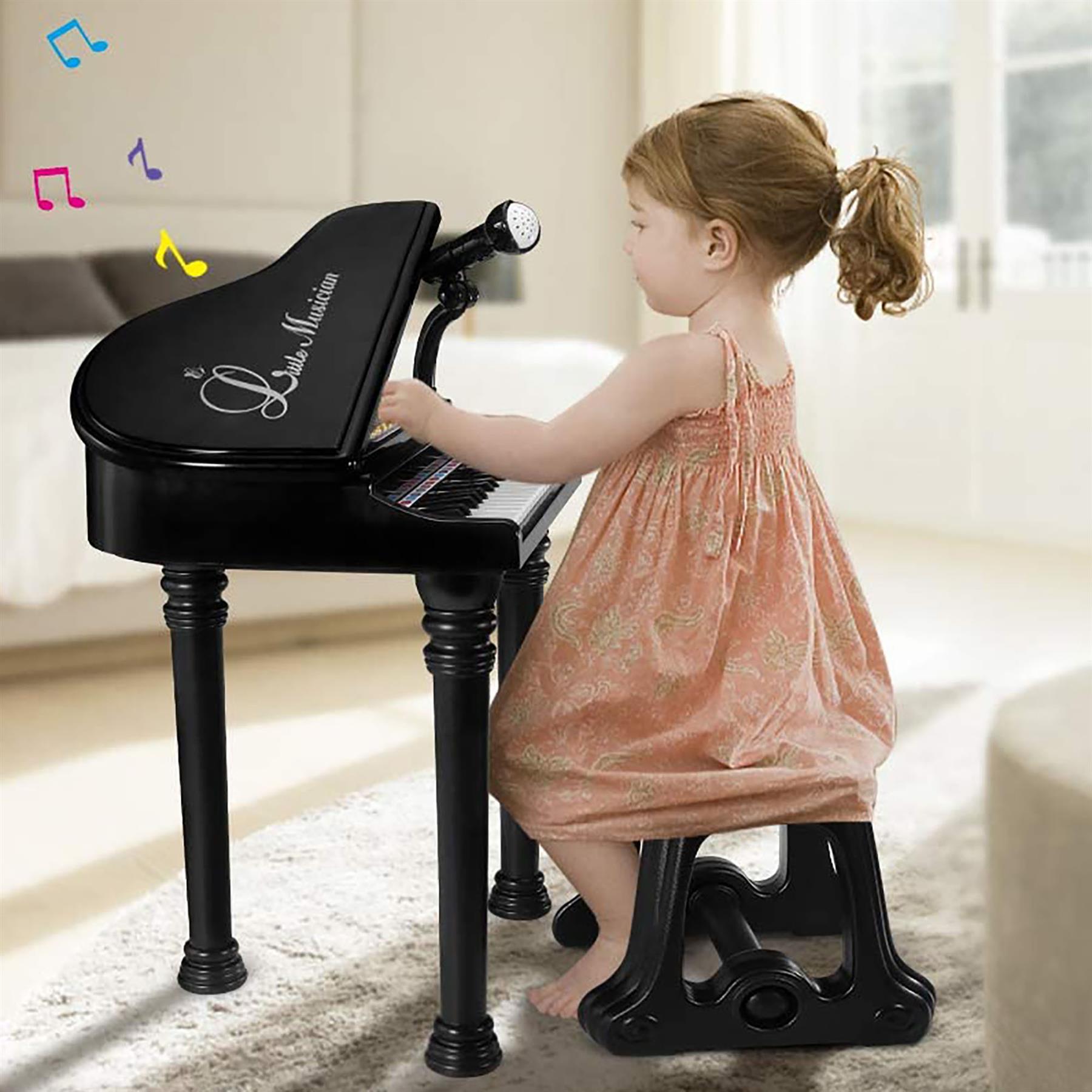 Black Electronic Piano With Microphone and Stool At The Magic Toy Shop