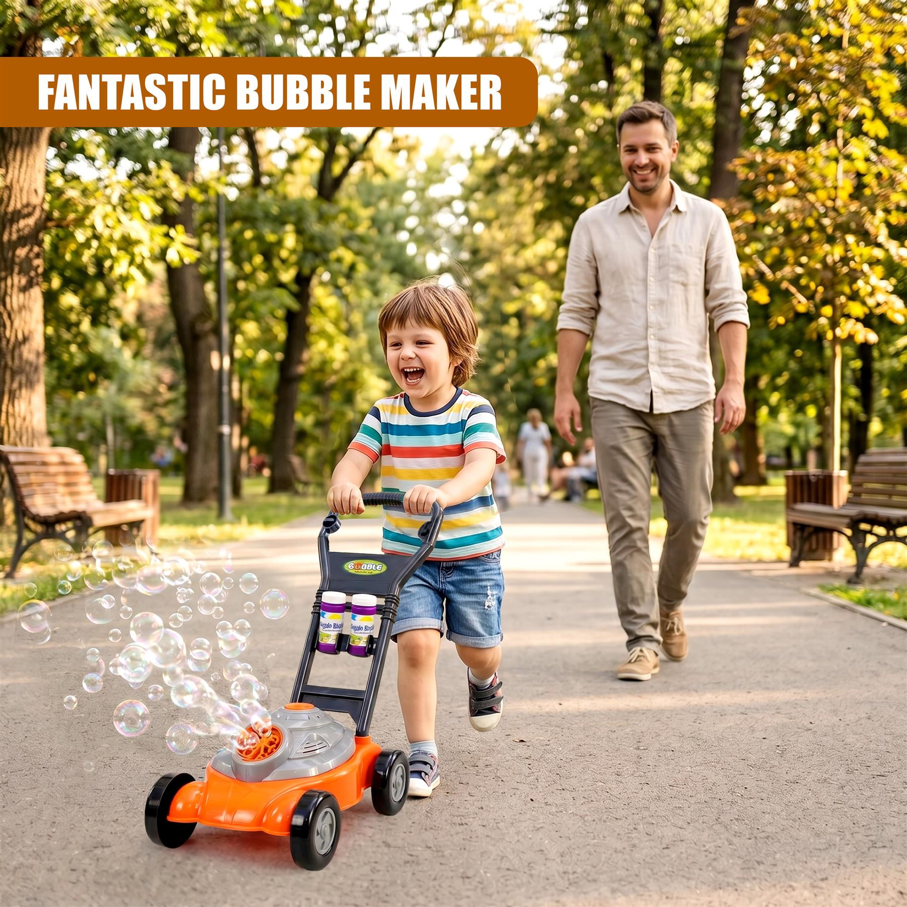 A child operates an orange bubble mower in a park while an adult watches from the background.