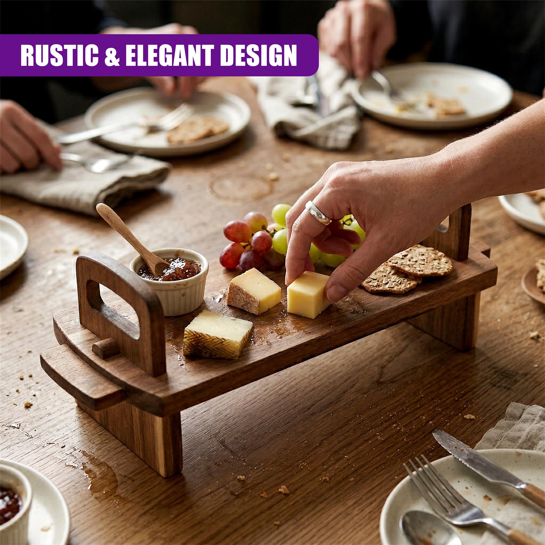 Wooden platter displaying cheese cubes, grapes, apple slices, and dipping sauce condiment.