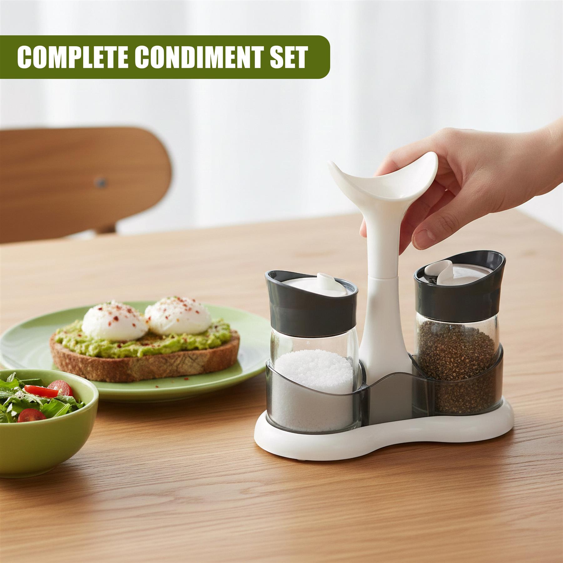 Modern white condiment set with shakers for salt and pepper, next to food.