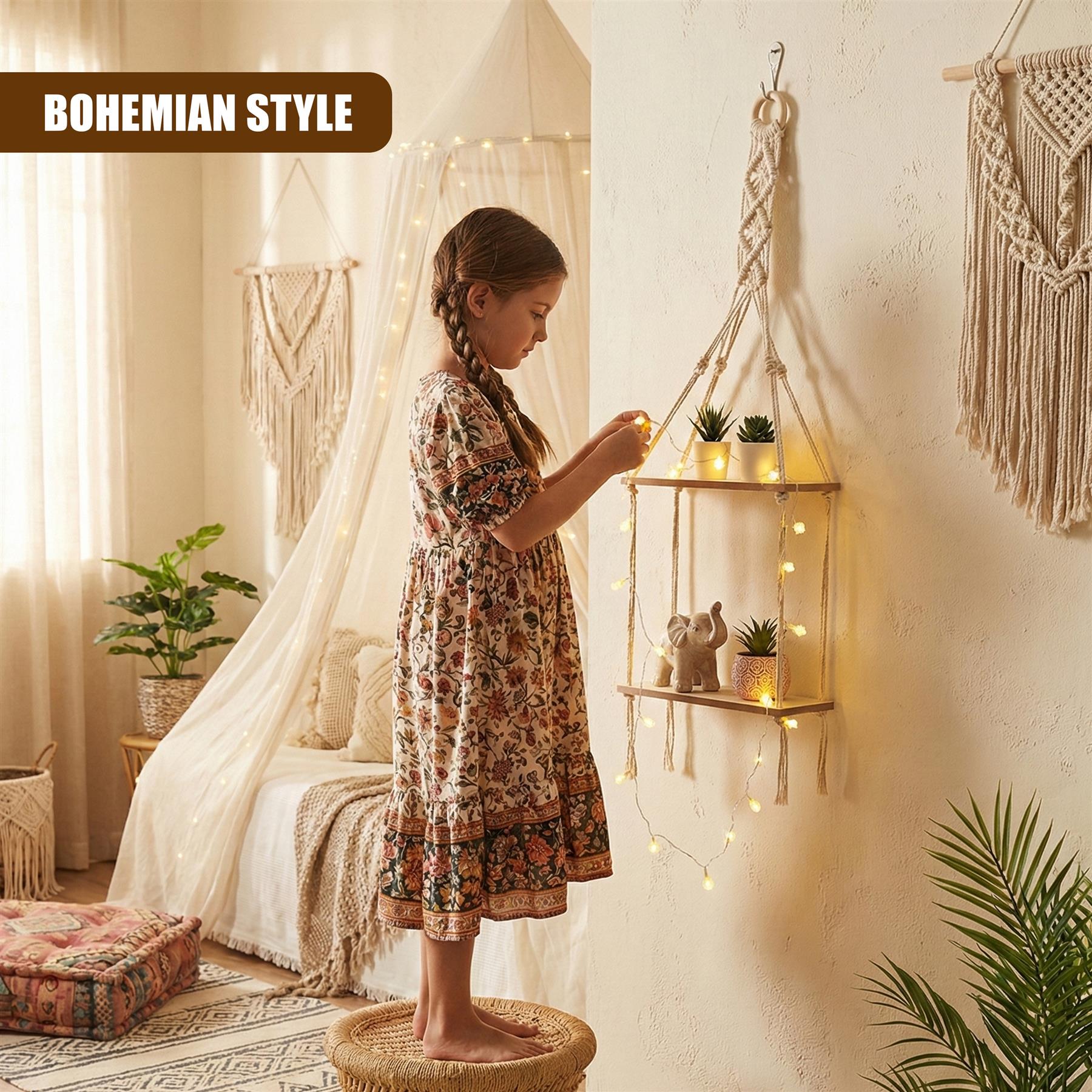 A young girl stands on a wicker stool, reaching for a hanging shelf in her bohemian-themed bedroom. The room features a white canopy bed, a woven rug, and a wall with a macrame wall hanging. The girl's dress is a flowy, floral patterned, and her hair is braided. The room's decor is a mix of bohemian and modern elements, with a mix of natural and industrial materials. - The Magic Toy Shop