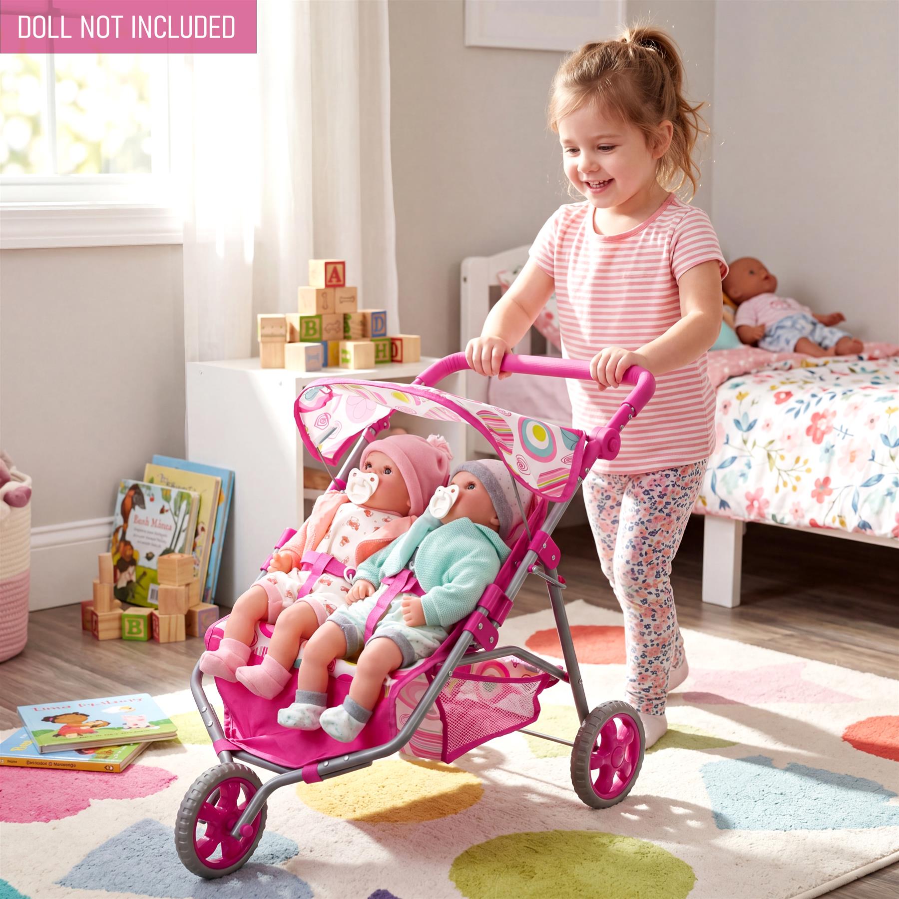 Three-wheeled pushchair designed for two dolls, featuring a carriage base and pink accents.