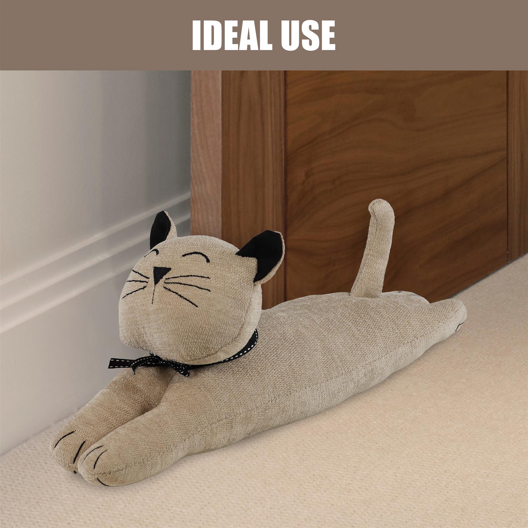 A black cat door stopper with a round shape and a clear plastic dome for easy visibility of the litter box, from The Magic Toy Shop.