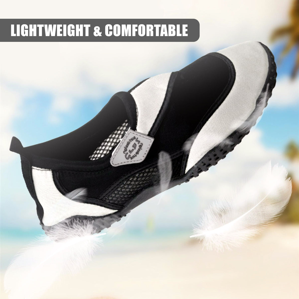 Grey GEEZY aqua shoes with a white sole and mesh panels, shown on a sandy beach