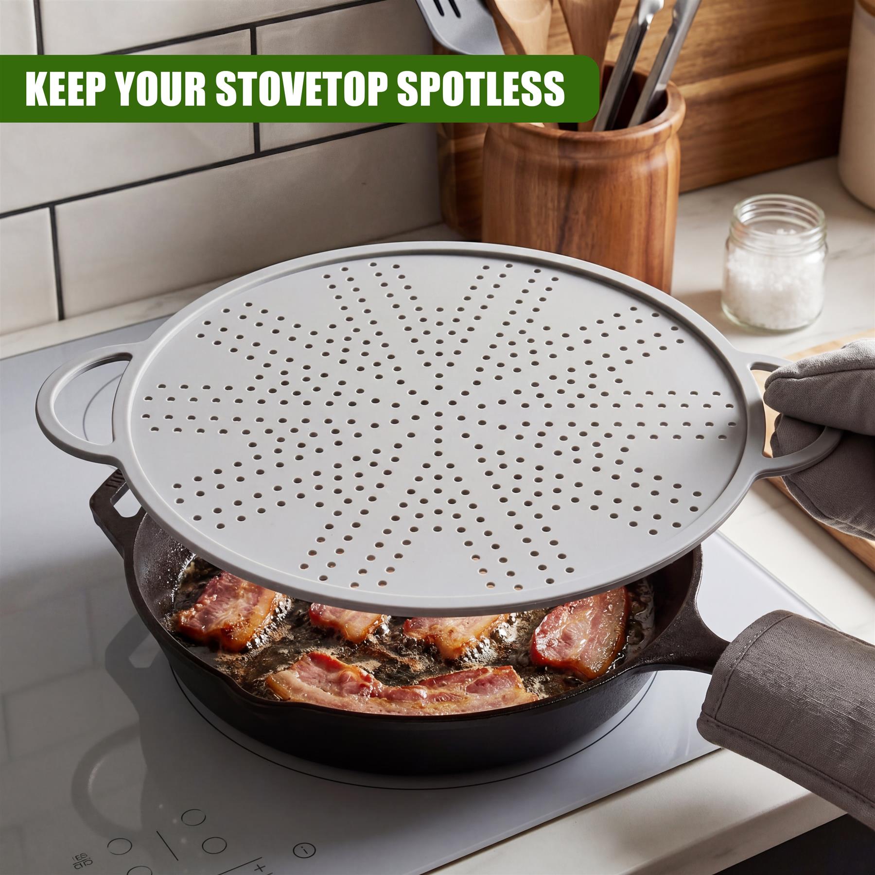 Perforated metal strainer placed over a pot of cooked meat and bacon pieces on a stovetop.