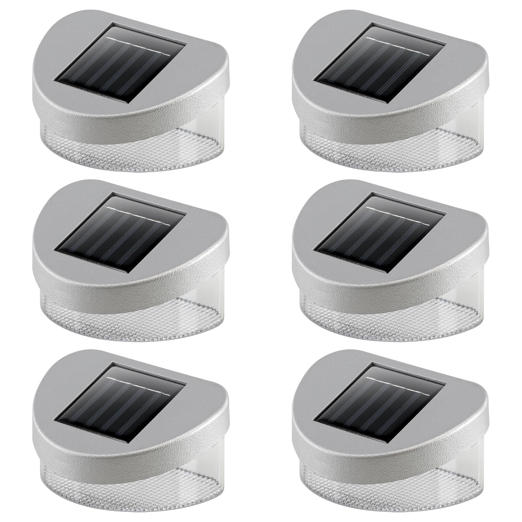 Small outdoor lighting units featuring visible solar panels and textured light gray plastic housing.