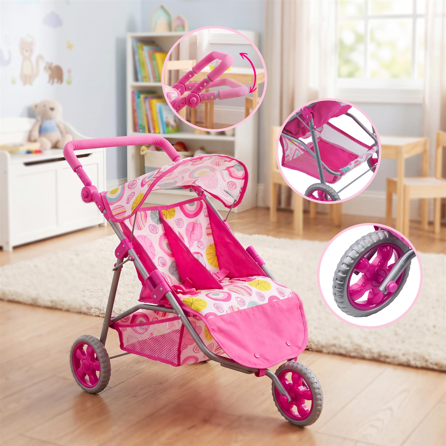 Pink baby pushchair with twin carriage seats attached to a three-wheeled chassis.
